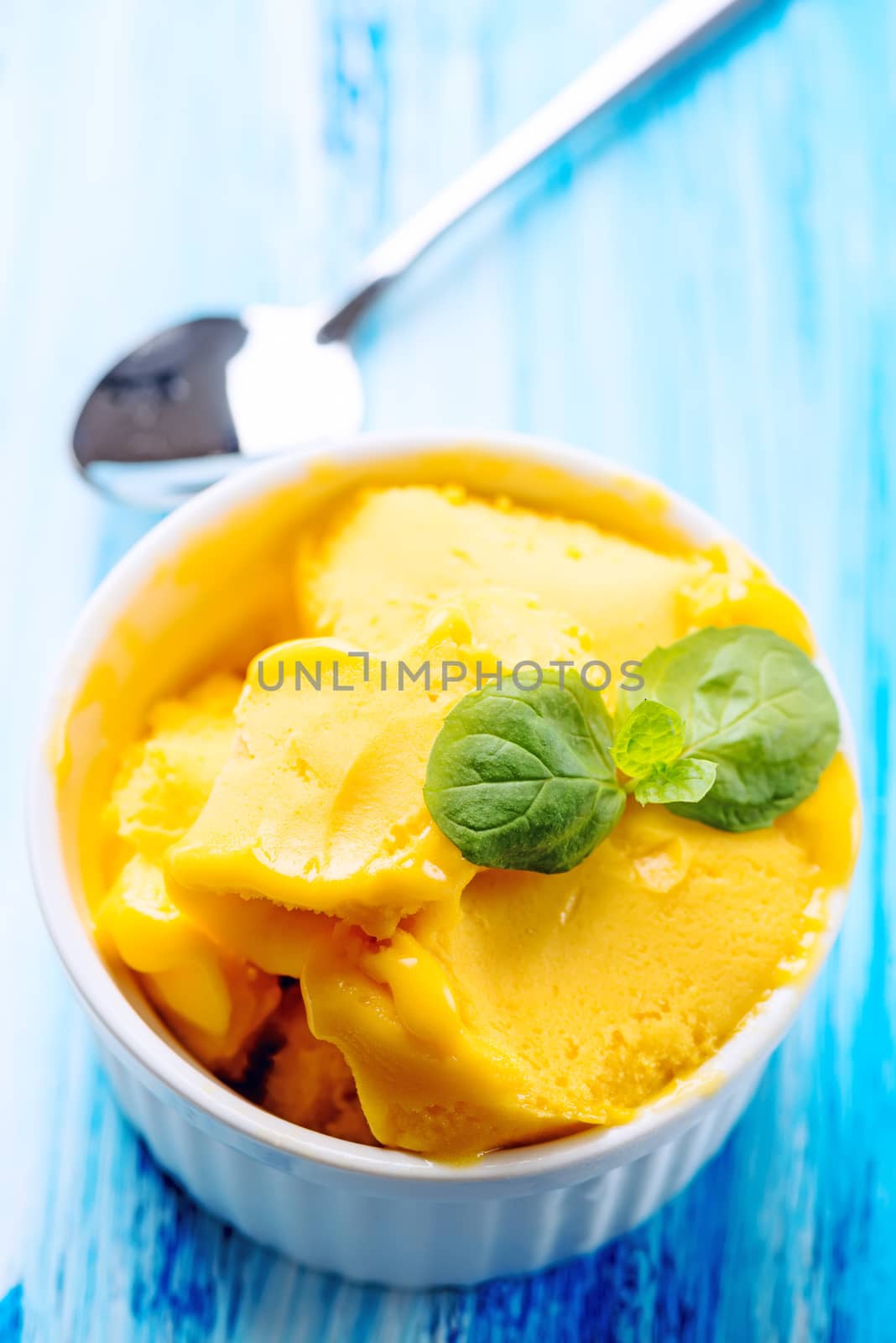 Passion fruit sherbet with mint leaves