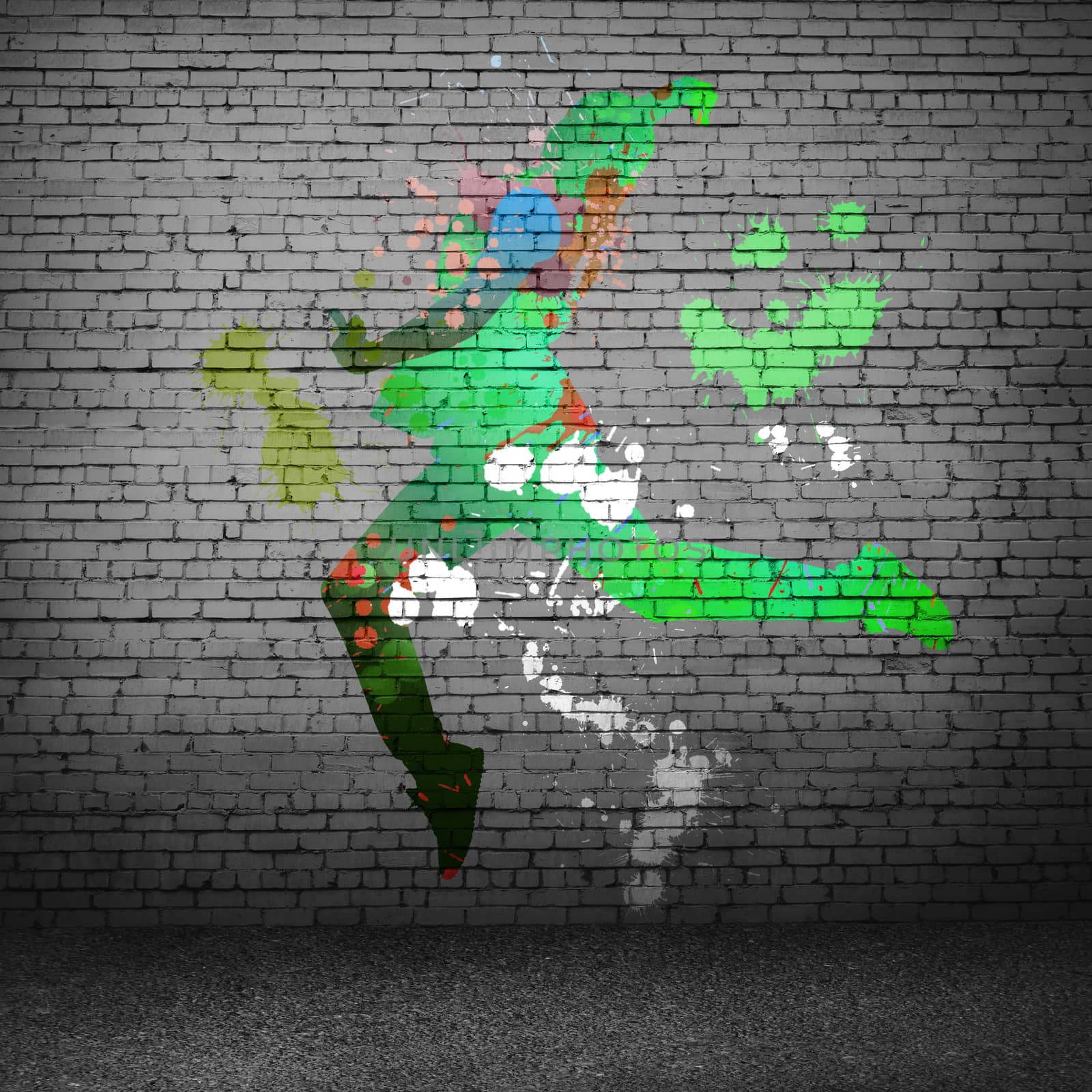 Image with color silhouette of dancer on gray wall