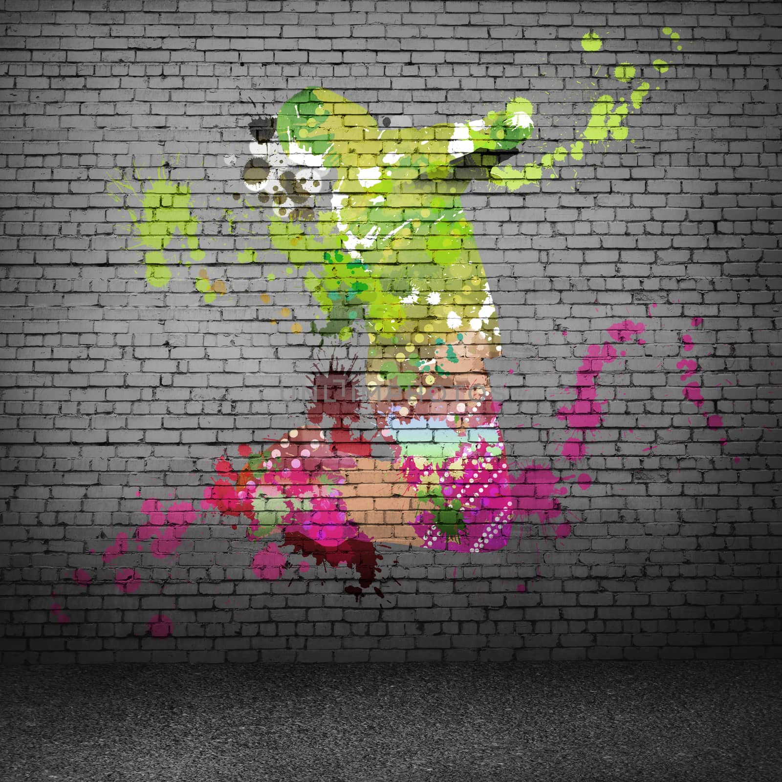 Image with color silhouette of dancer on gray wall