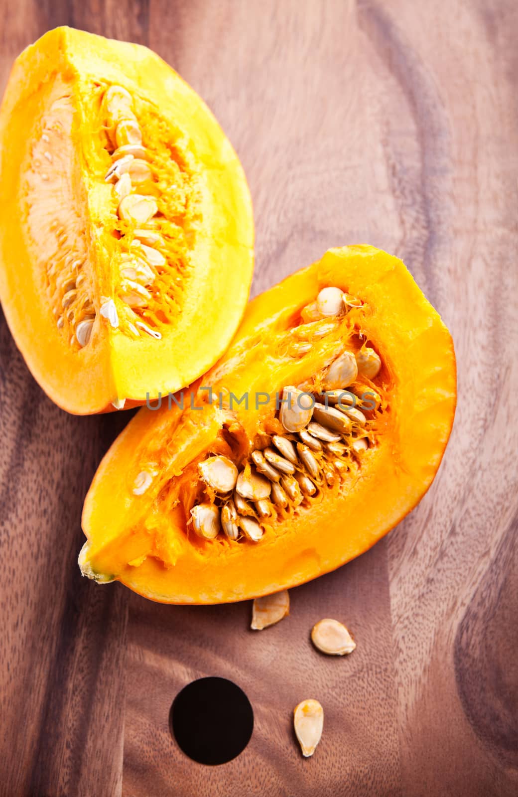 A slice of fresh Pumpkin on wooden table