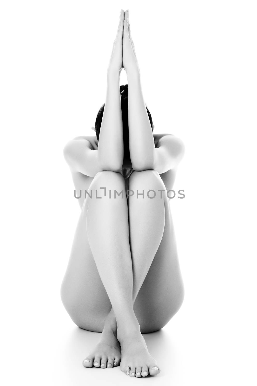 Naked woman on a white background