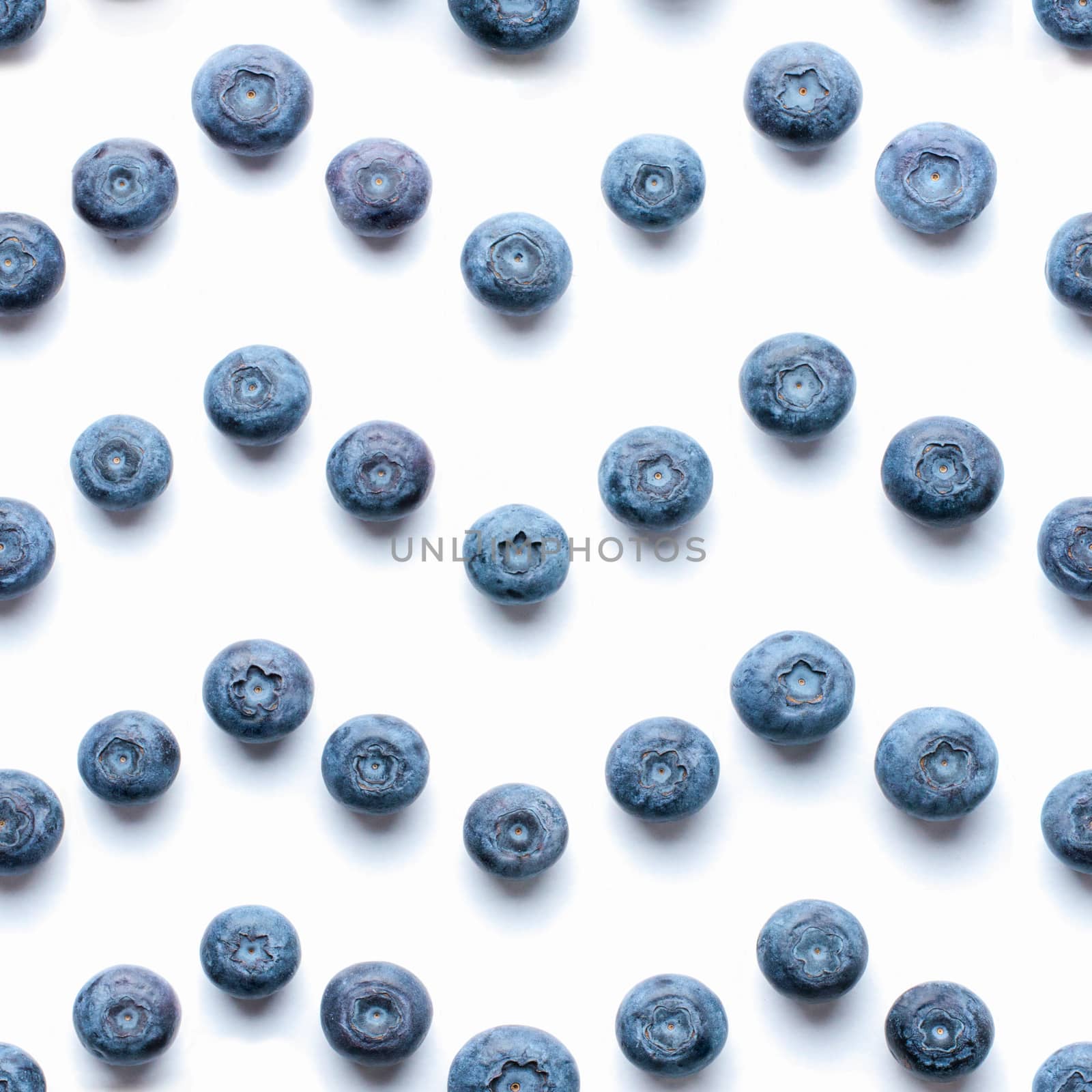 Beautiful trendy seamless pattern blueberries. Blueberry pattern isolated on white background. Blueberry border design. Top view or flat lay