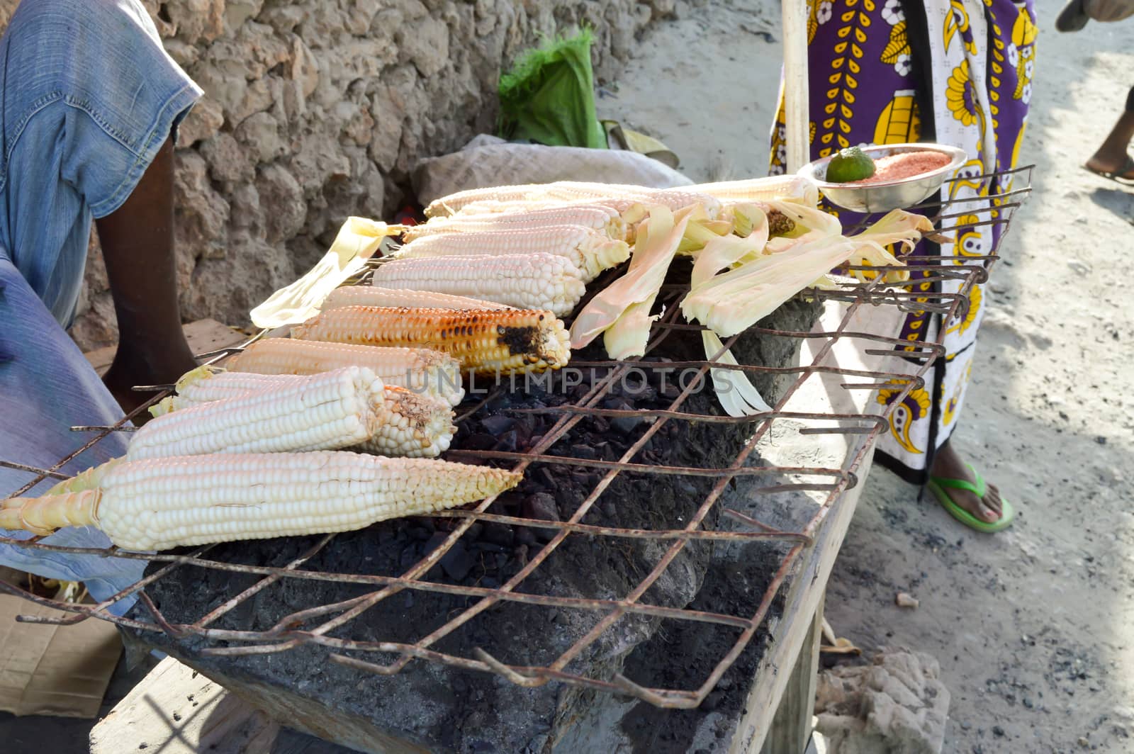 Ears of barbecued corn in the town of Bamburi near Mombasa, Kenya