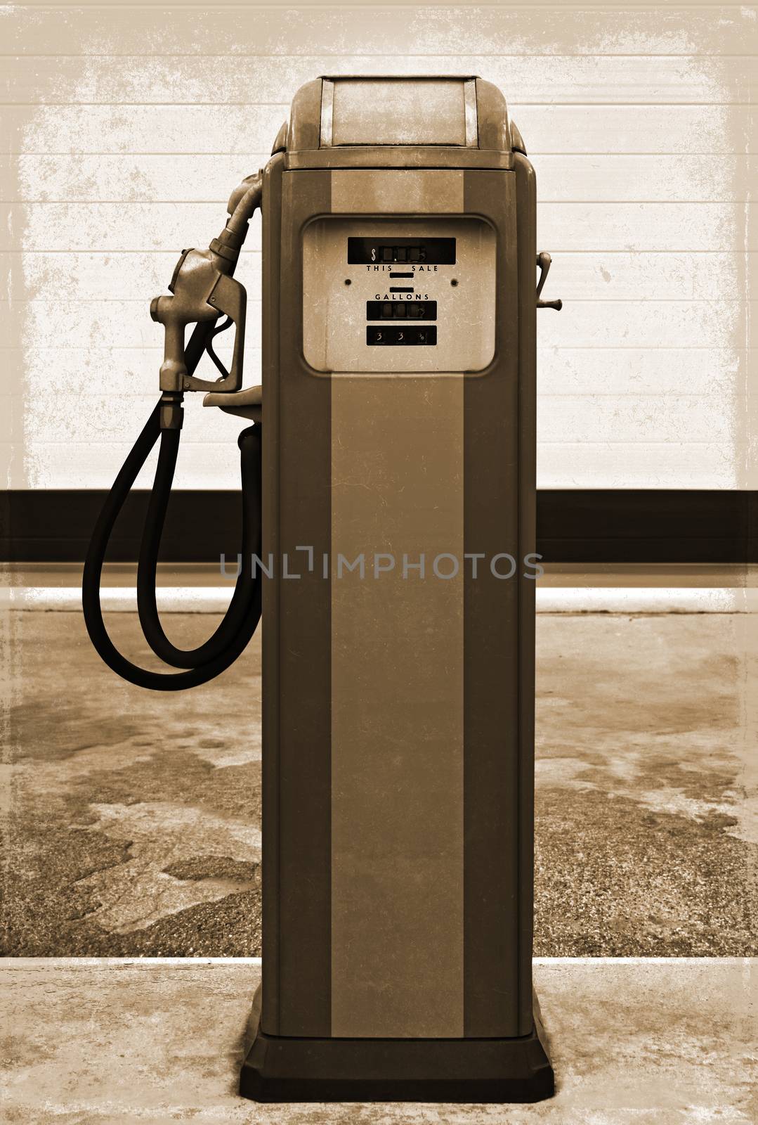 vintage gasoline station gas pump in the setting of an old gas station