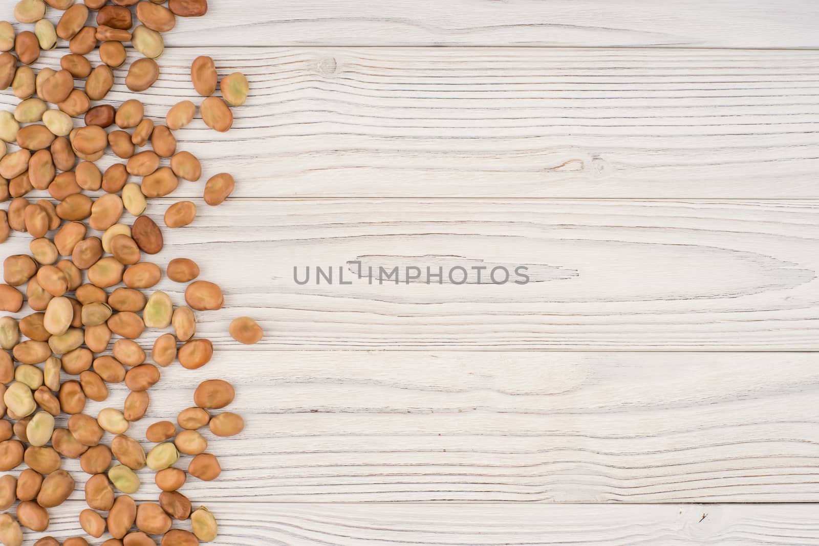 The beans on the old wooden table.  by DGolbay