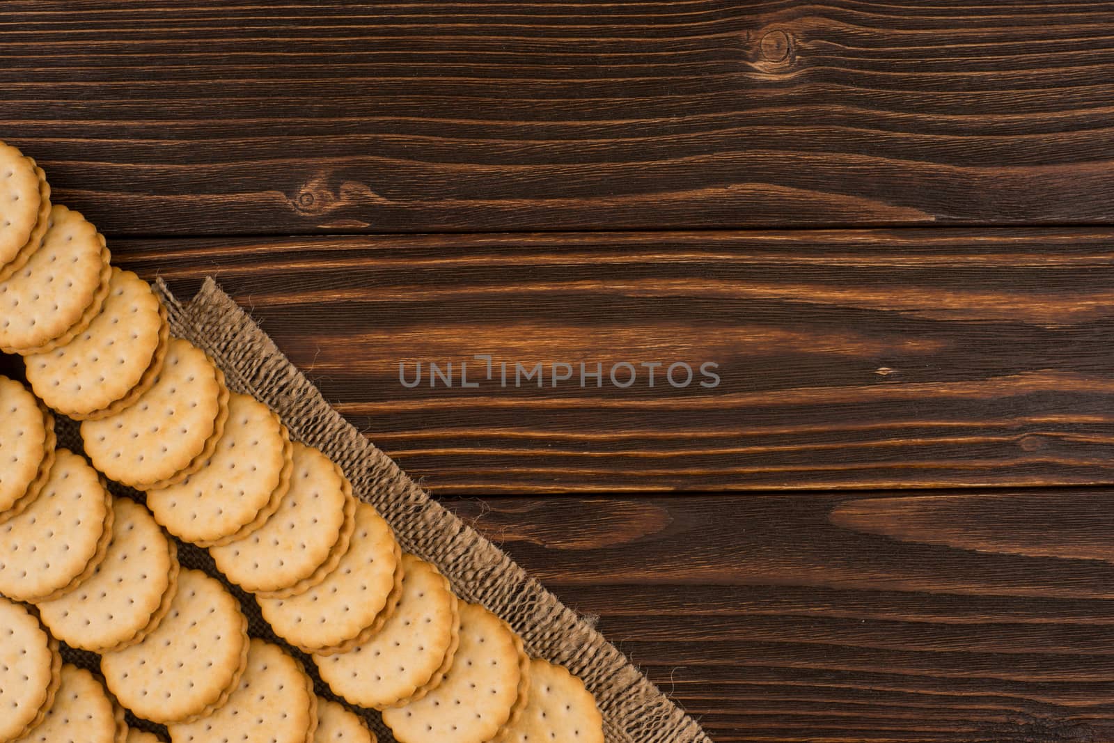 Cookies on the old wooden table. Top view.