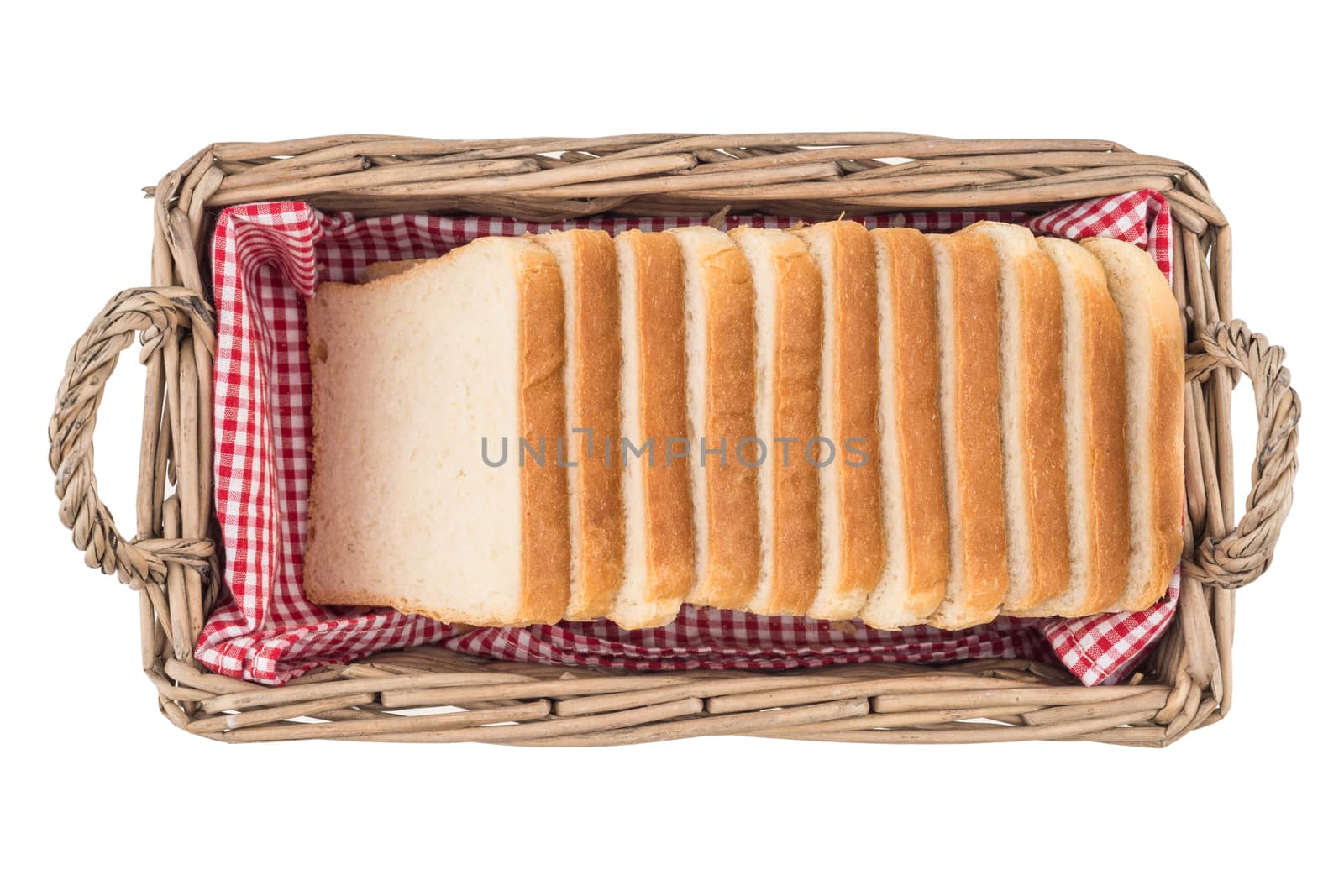 White bread in basket. Slice. Isolated on white background. Top view.