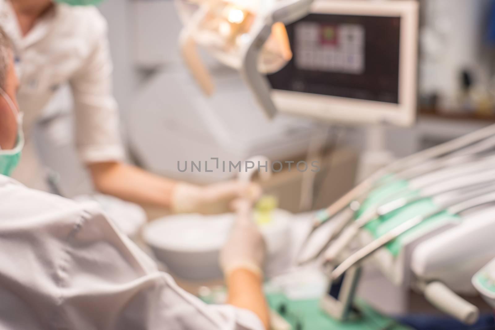 Blur abstract background work with doctor dentist. Blurry view hospital clinical room space with equipment instrument