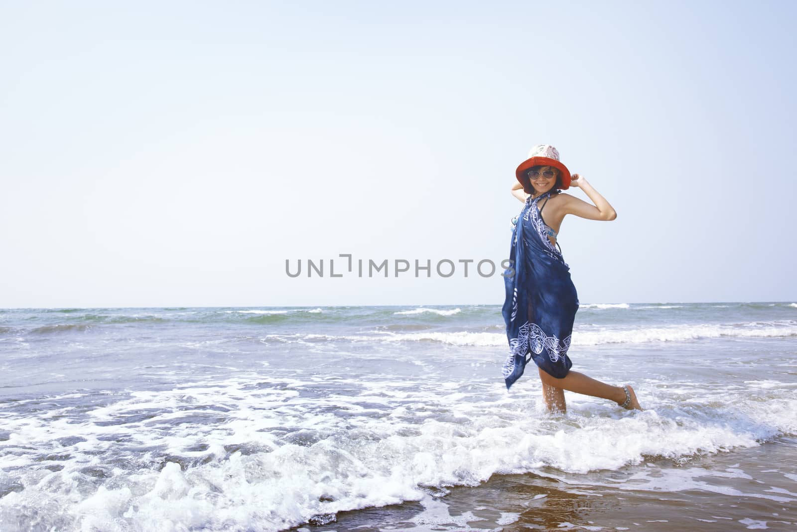 Happy woman at Atlantic ocean