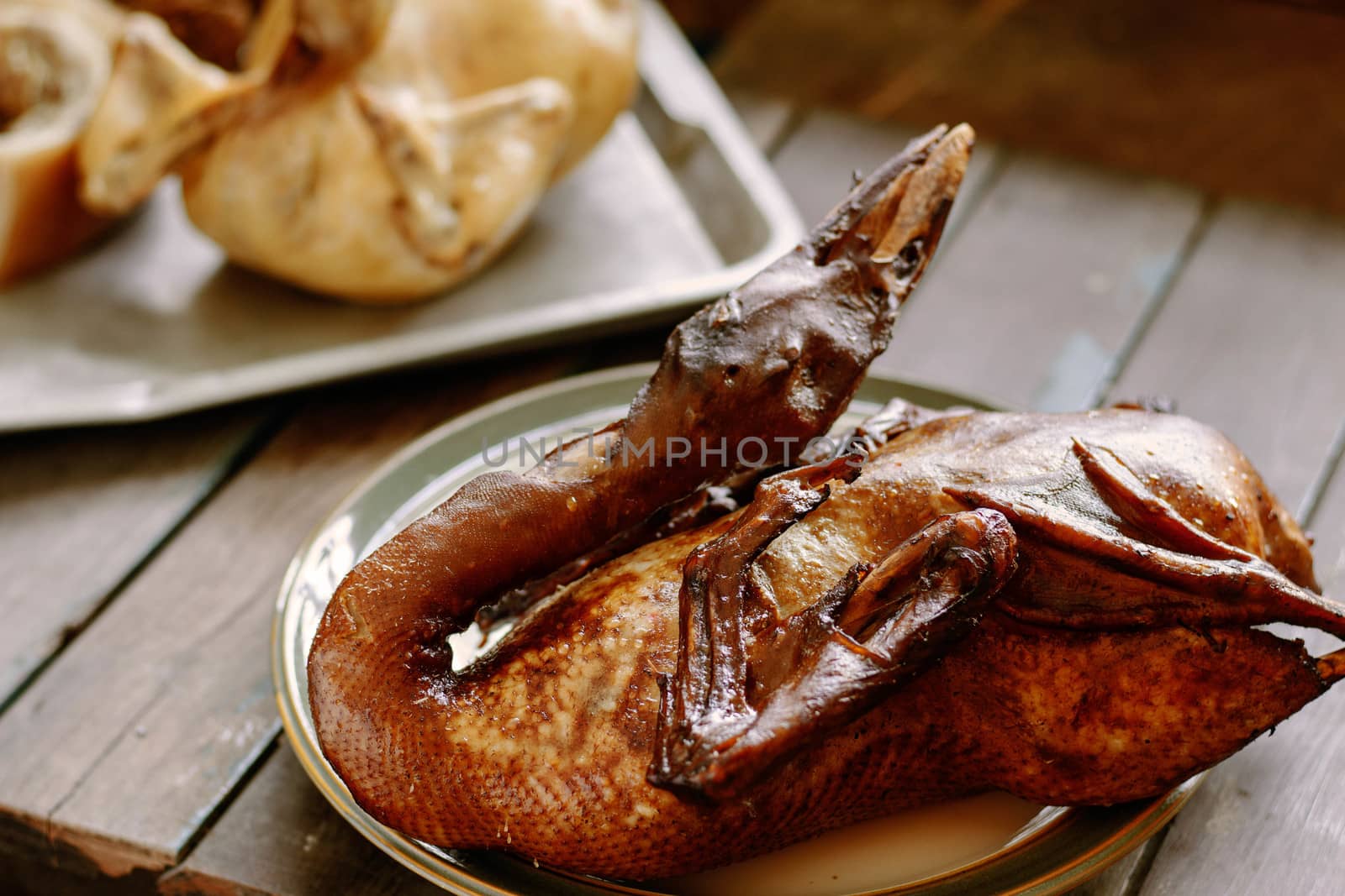 Duck on a tray in the kitchen to cooking.