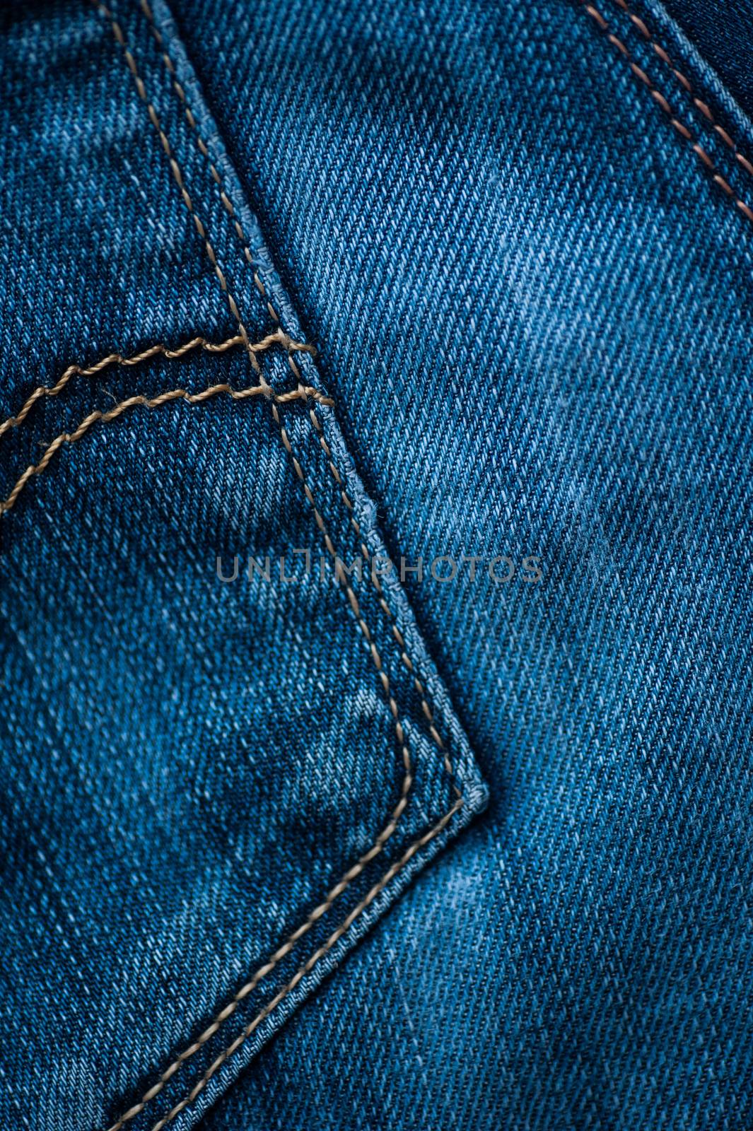 texture of jeans, stitching on the pants closeup by timonko