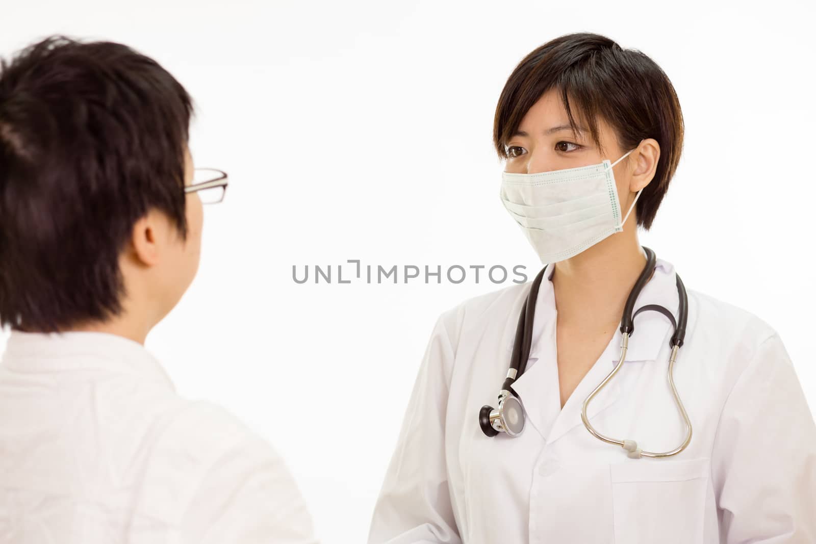 Chinese female doctor with patient