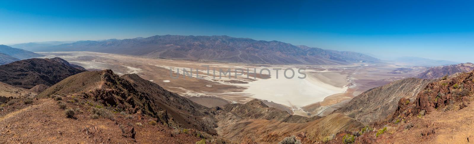 Dante's View is a viewpoint terrace at 1,669 m (5,476 ft) height, on the north side of Coffin Peak, along the crest of the Black Mountains, overlooking Death Valley. Dante's View is about 25 km (16 mi) south of Furnace Creek in Death Valley National Park.