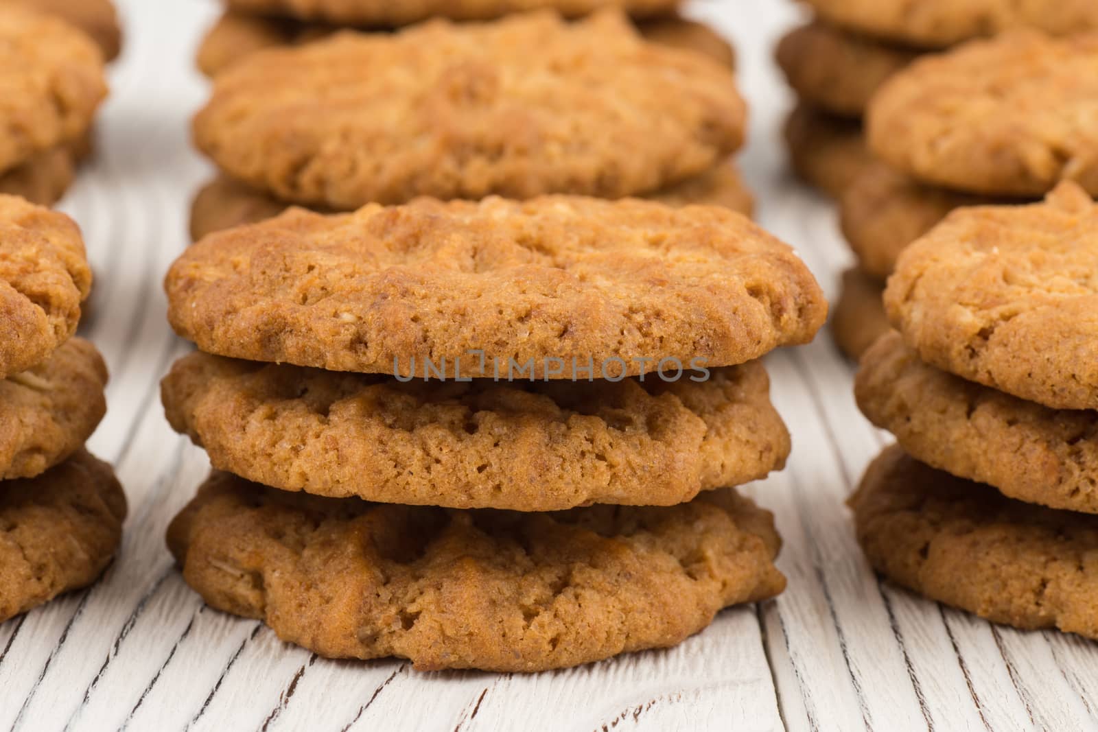 Cookie on old white wooden table. Selective focus.