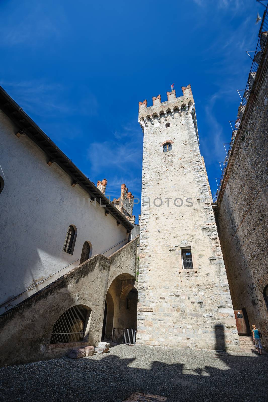 Sirmione, province of Brescia, Lombardy, northern Italy, 15th August 2016: people visiting the interior of medieval castle Scaliger on lake Lago di Garda