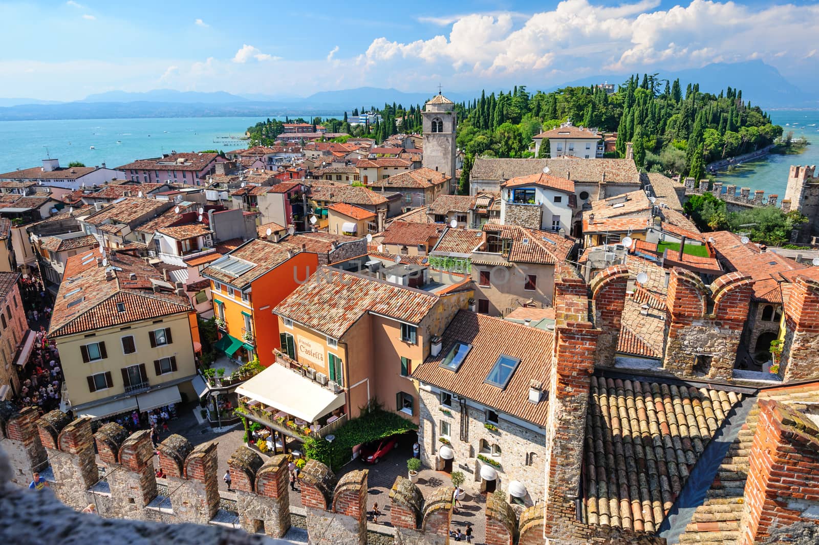 Sirmione, province of Brescia, Lombardy, northern Italy - 15th August 2016: view to the old roofs of Sirmione town on lake Lago di Garda