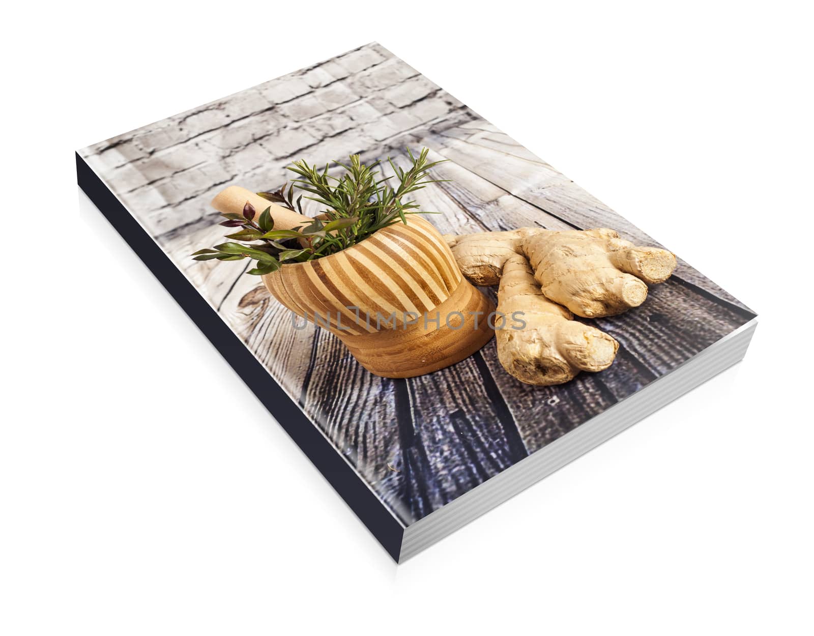 book of Ginger and herbs on a wooden board