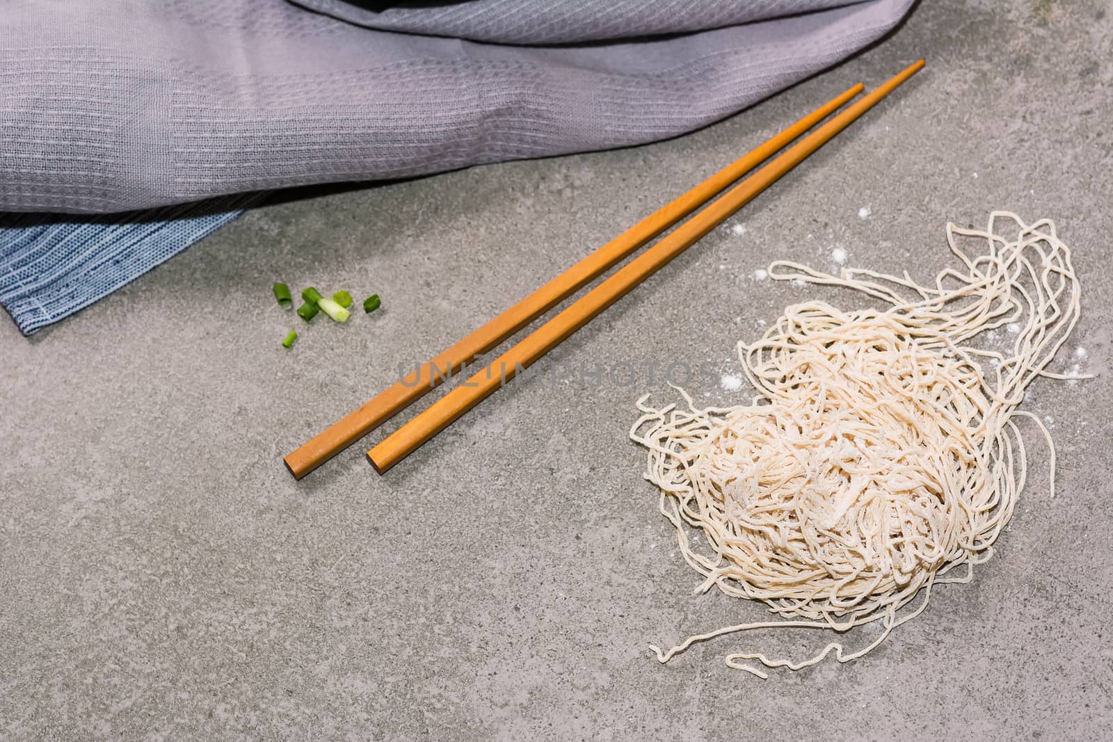 view top noodle and chopsticks on background