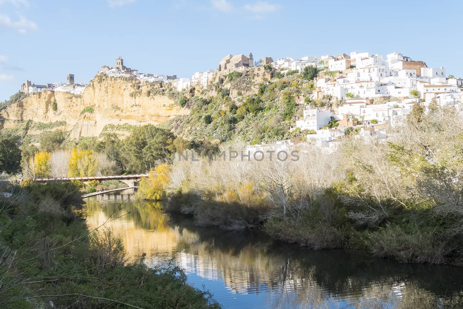 Panoramic of Arcos de la Frontera reflected in the river, white  by max8xam