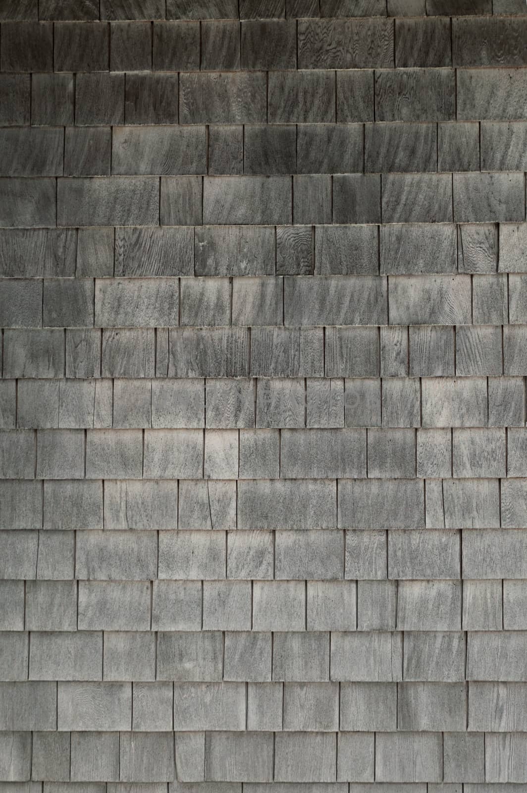 Neat. tidy. newer grey cedar shakes shingles background