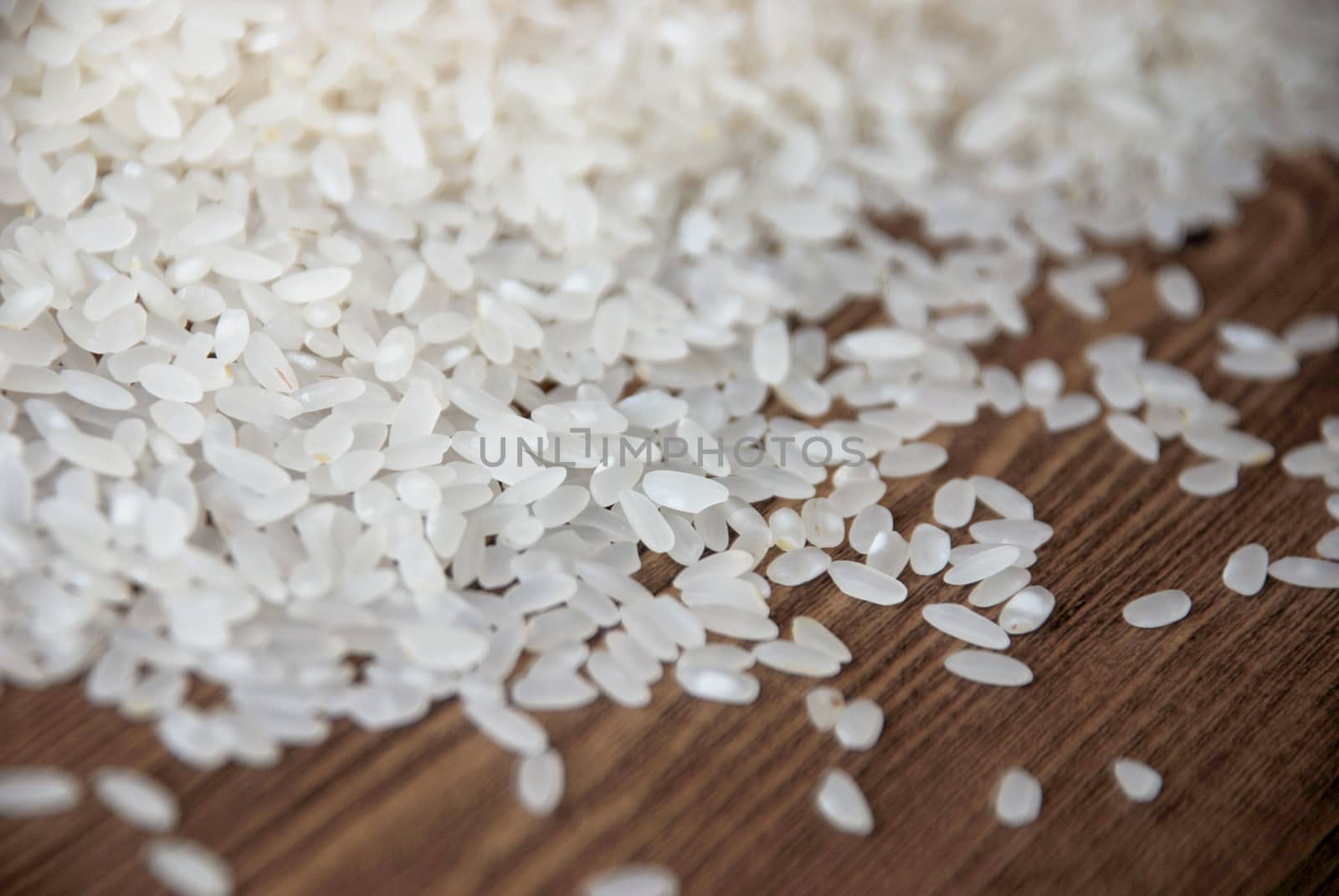 Delicious white rice grains on the table close-up background image