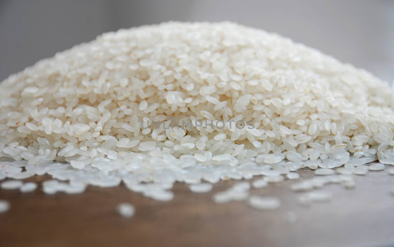 Delicious white rice grains on the table close-up background image
