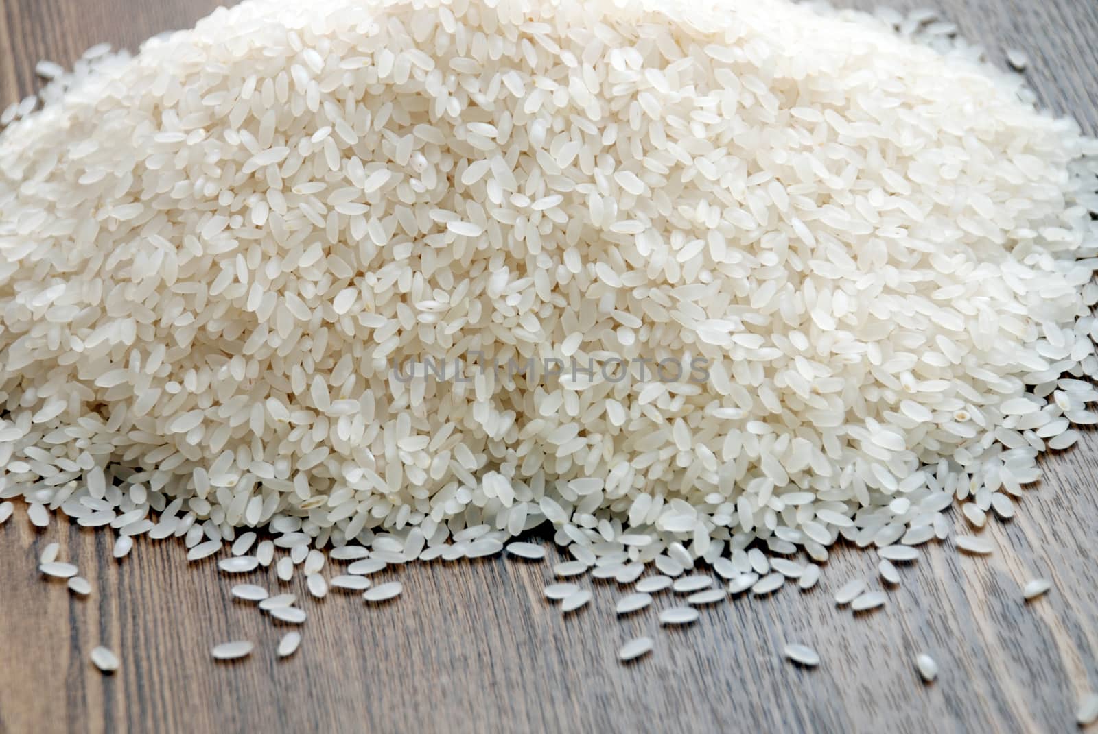 Delicious white rice grains on the table close-up background image