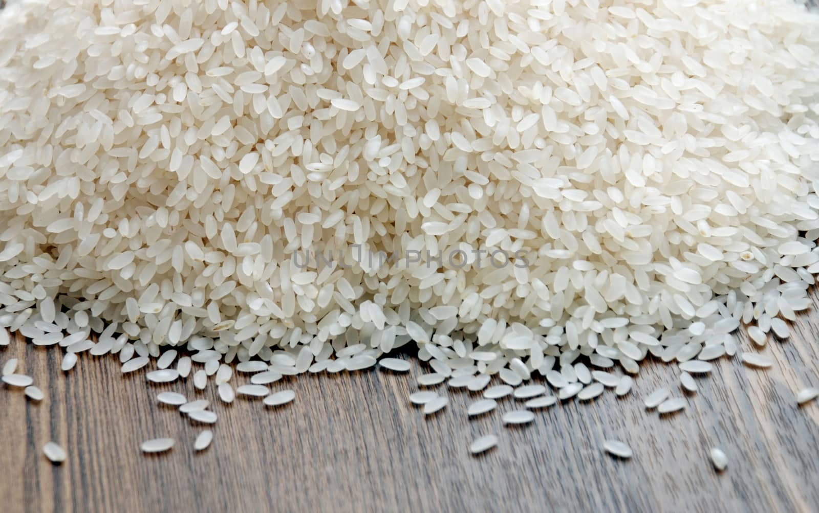 Delicious white rice grains on the table close-up background image
