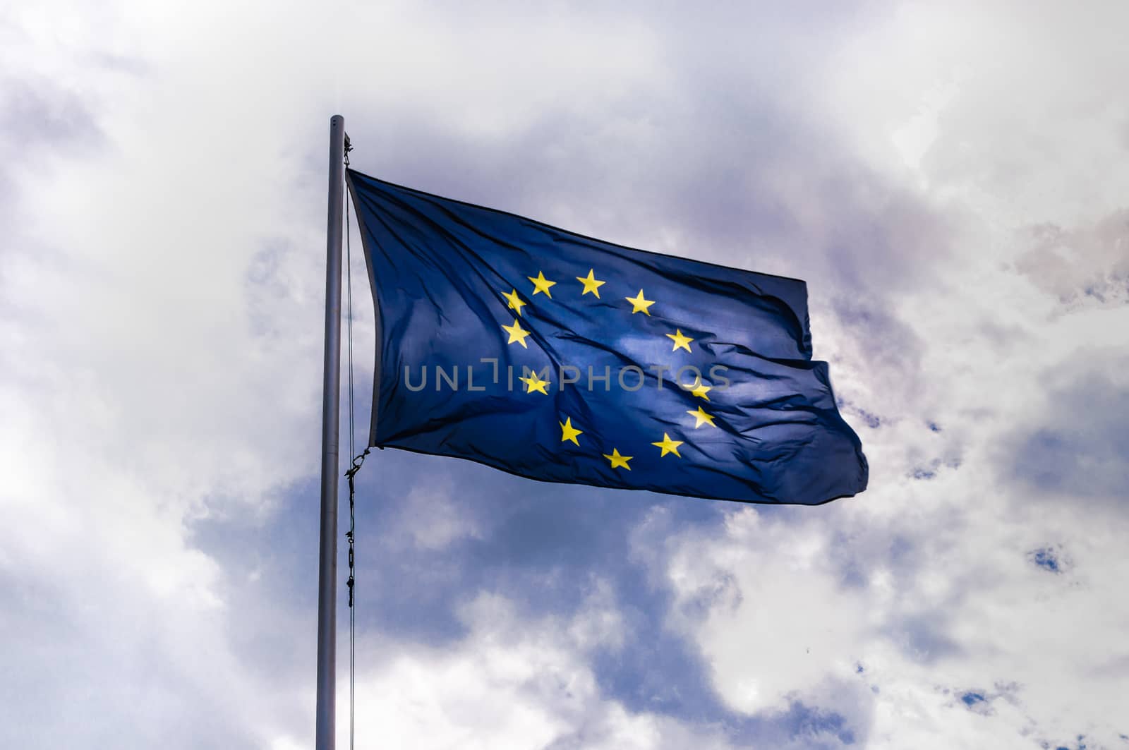 Flag of Europe in dramatic sky