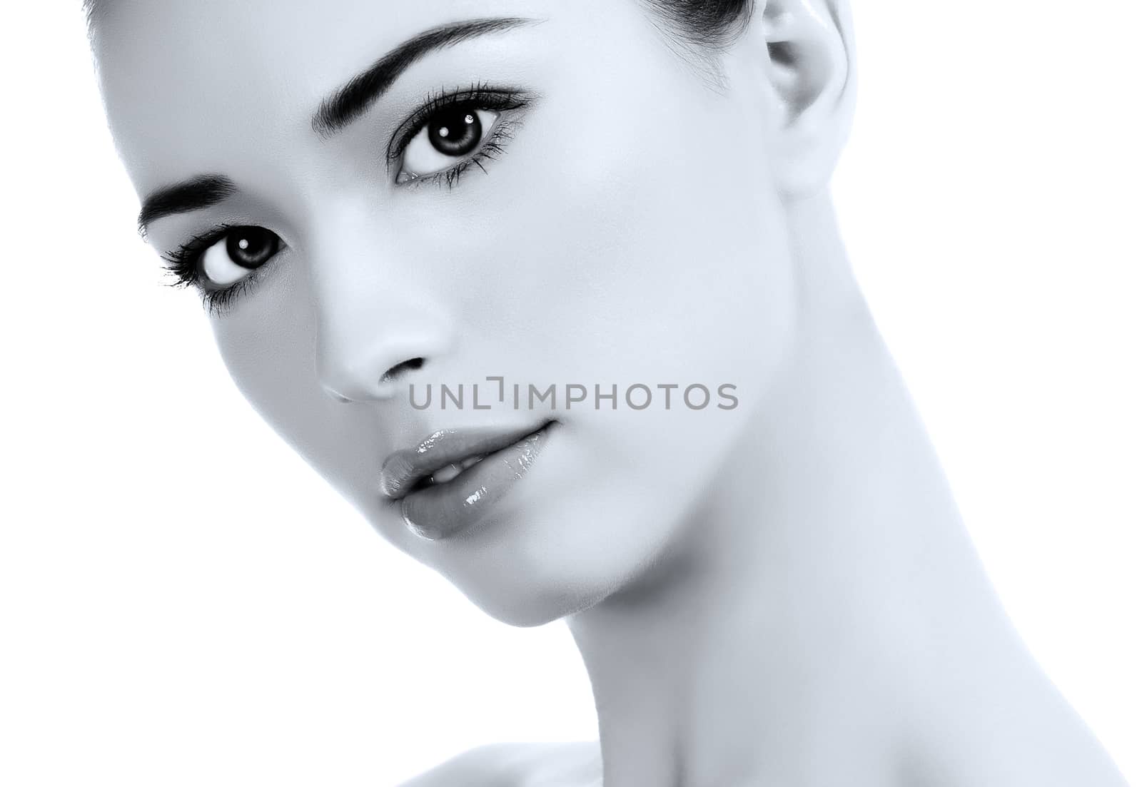 Beautiful girl with clean fresh skin, white background