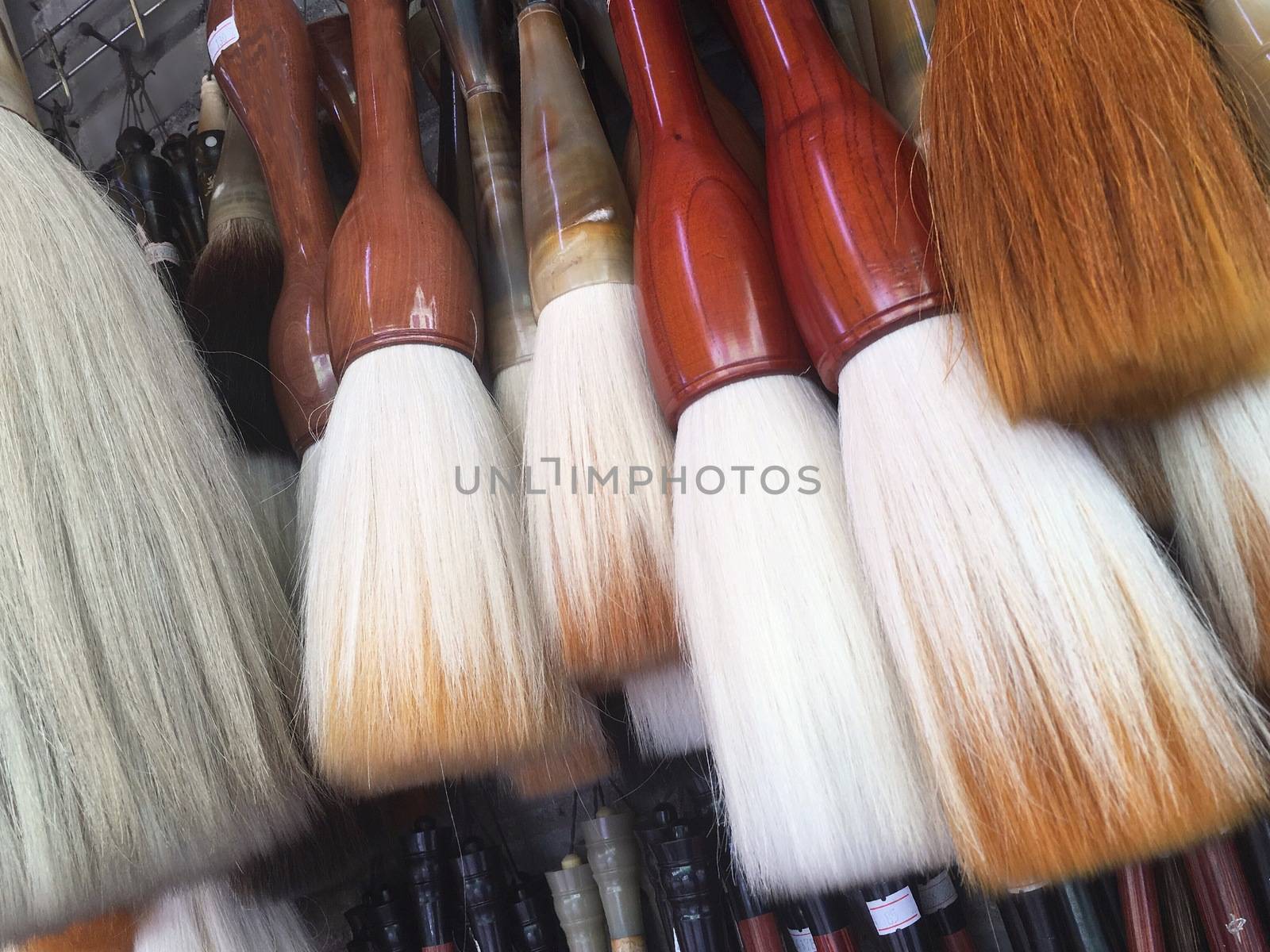 Closeup of Chinese calligraphy brushes. Set of Zen calligraphy brushes, paintbrush s, writing brushes use for writing Chinese, Japanese, Korean lettering.