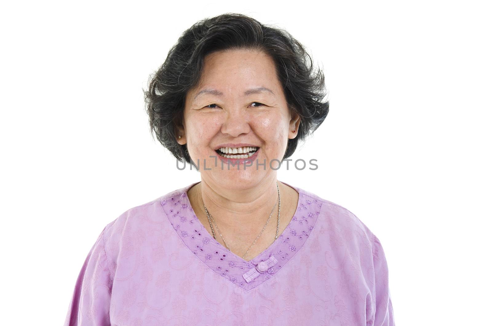 Portrait of Asian senior adult woman smiling, isolated on white background.