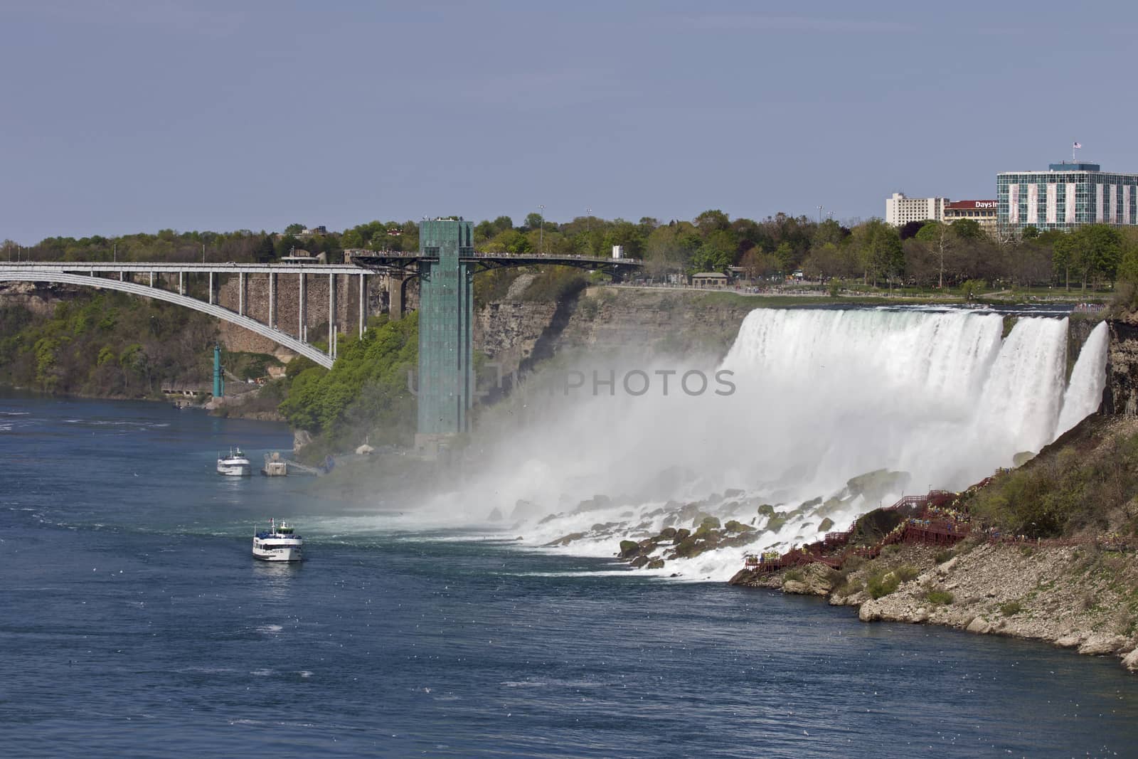 Beautiful photo of the amazing Niagara waterfall and the bridge at US side by teo