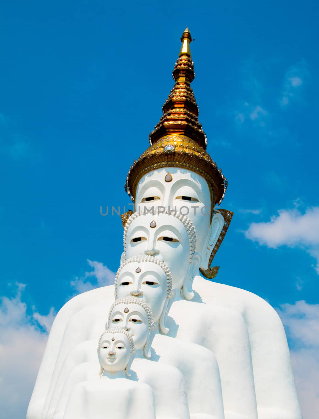 Phetchabun, Thailand - February 23.2017: Buddha statues and colored foot path colorful glass stacked in Wat Pha Kaew, Khao Kho, Phetchabun on February 23.2017 at Thailand.There. A famous Buddhist temple.