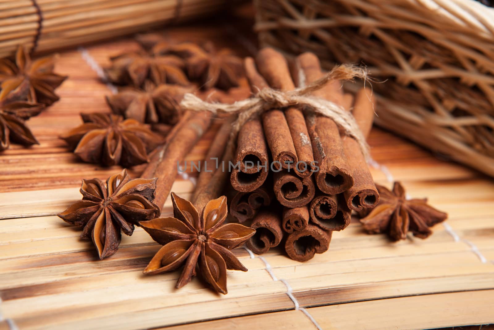 cinnamon and star anise on a bamboo napkin close up