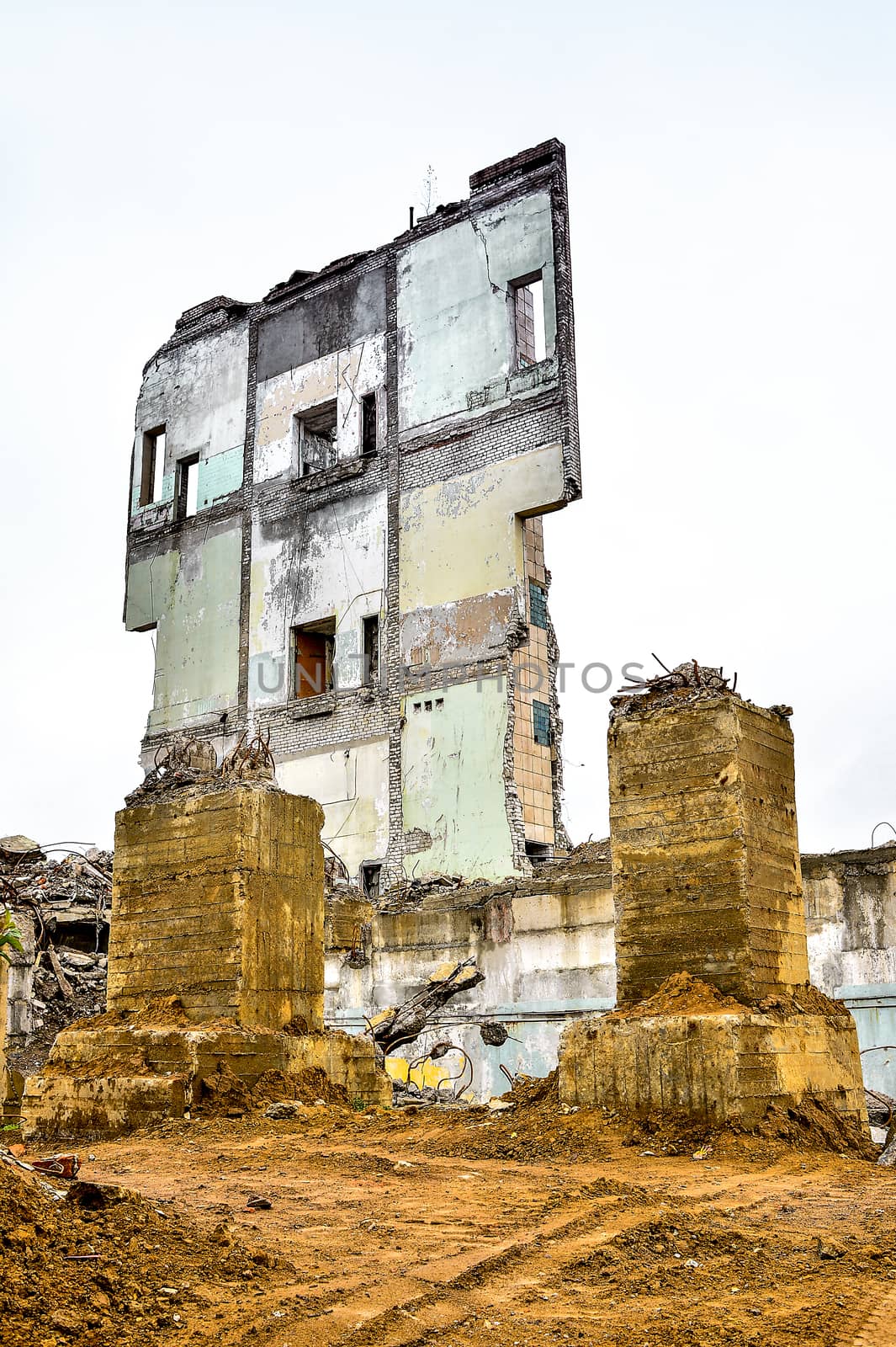 Pieces of Metal and Stone are Crumbling from Demolished Building Floors