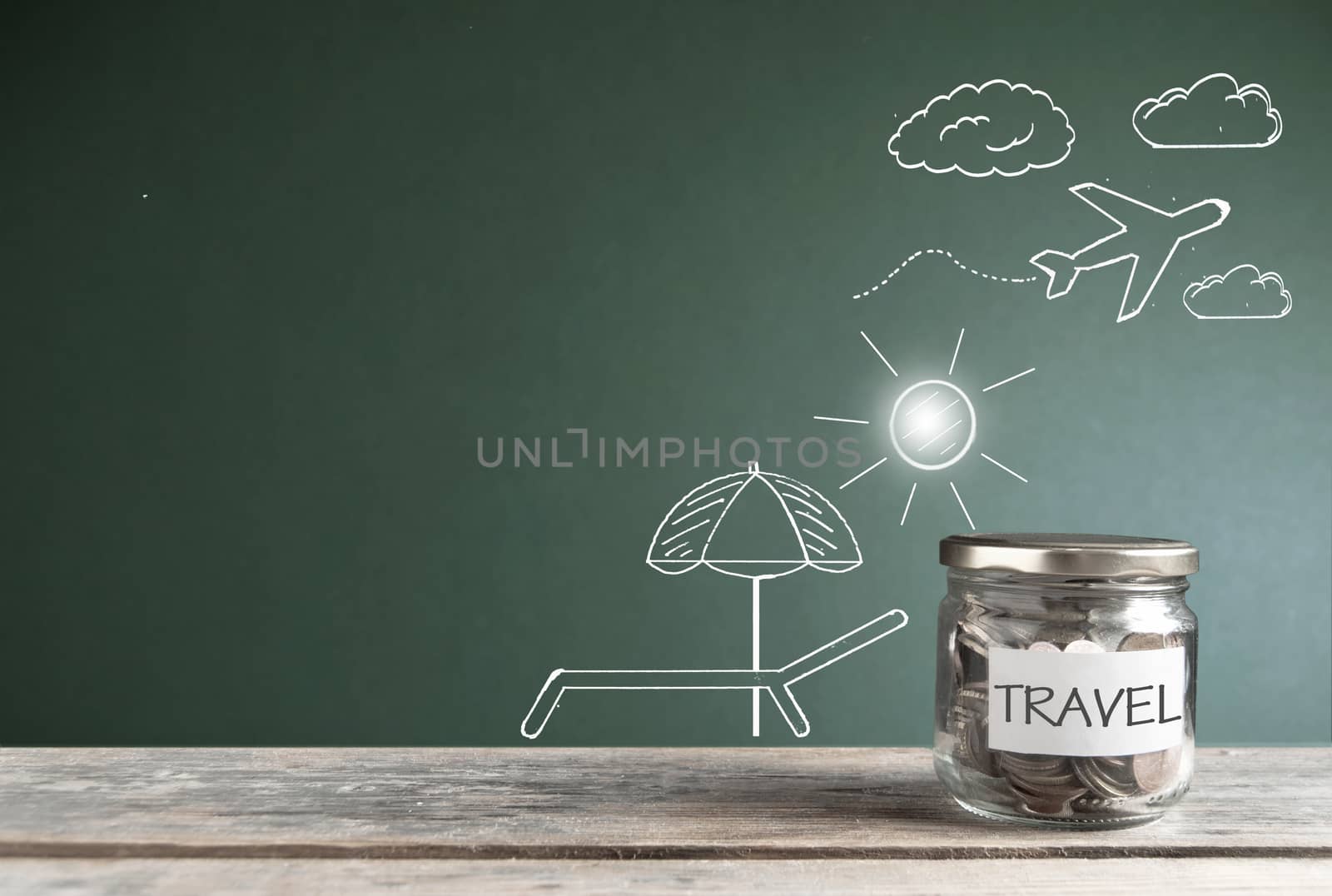 Travel savings jar background by unikpix