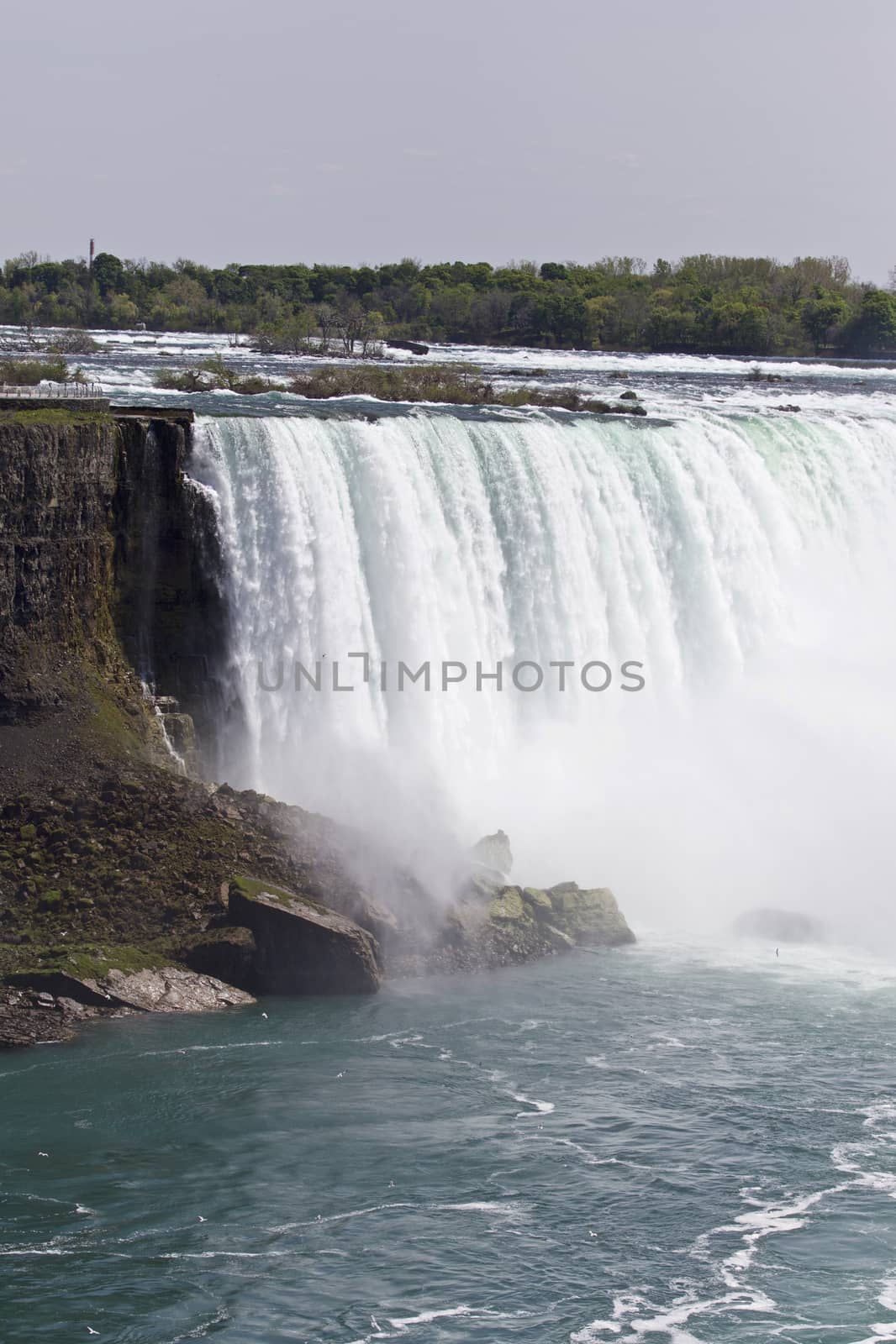 Beautiful isolated picture with the amazing Niagara falls Canadian side by teo