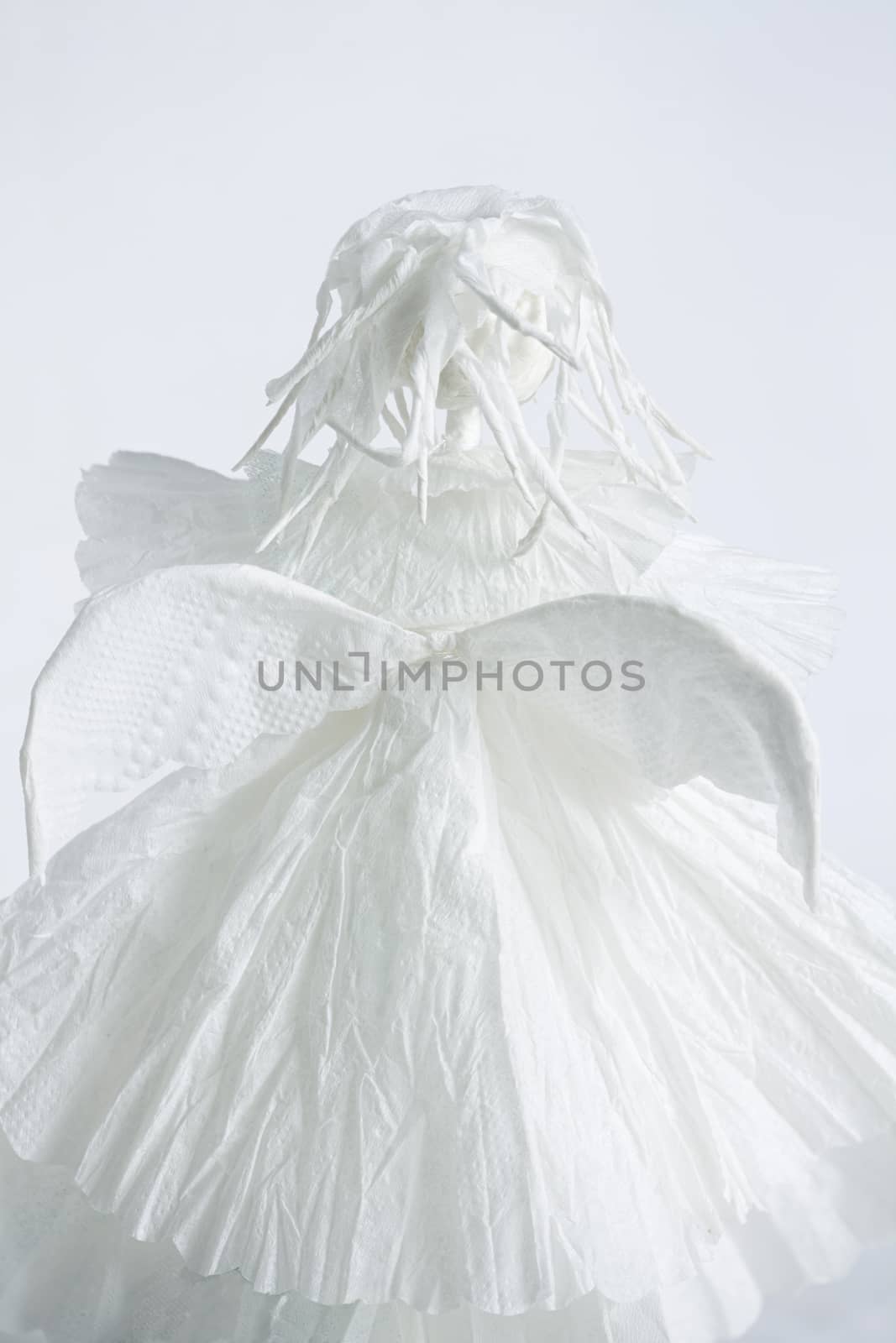 White Winged Angel Paper figure close to