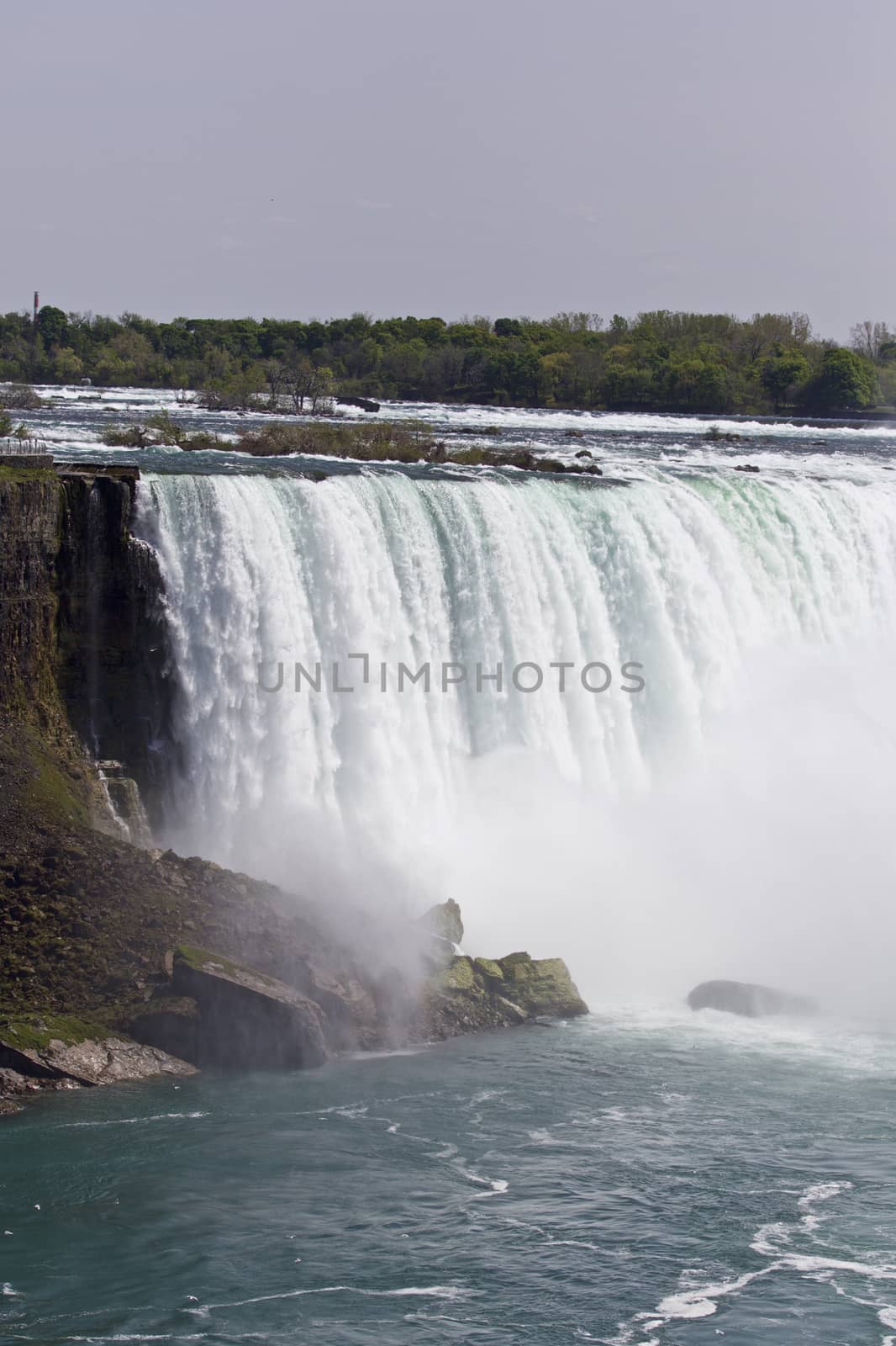 Beautiful background with the amazing Niagara falls Canadian side by teo