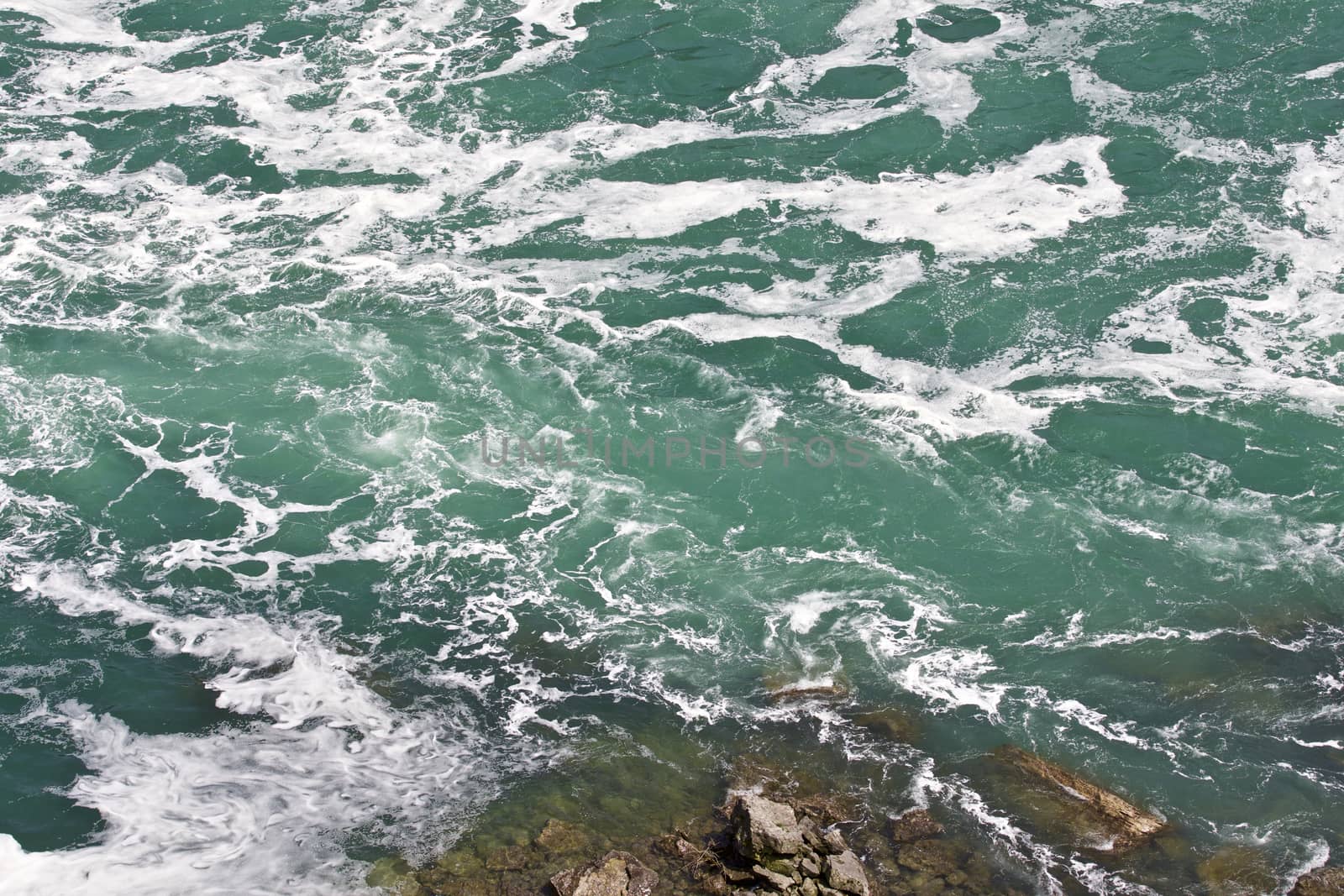 Beautiful background with the water near amazing Niagara falls by teo