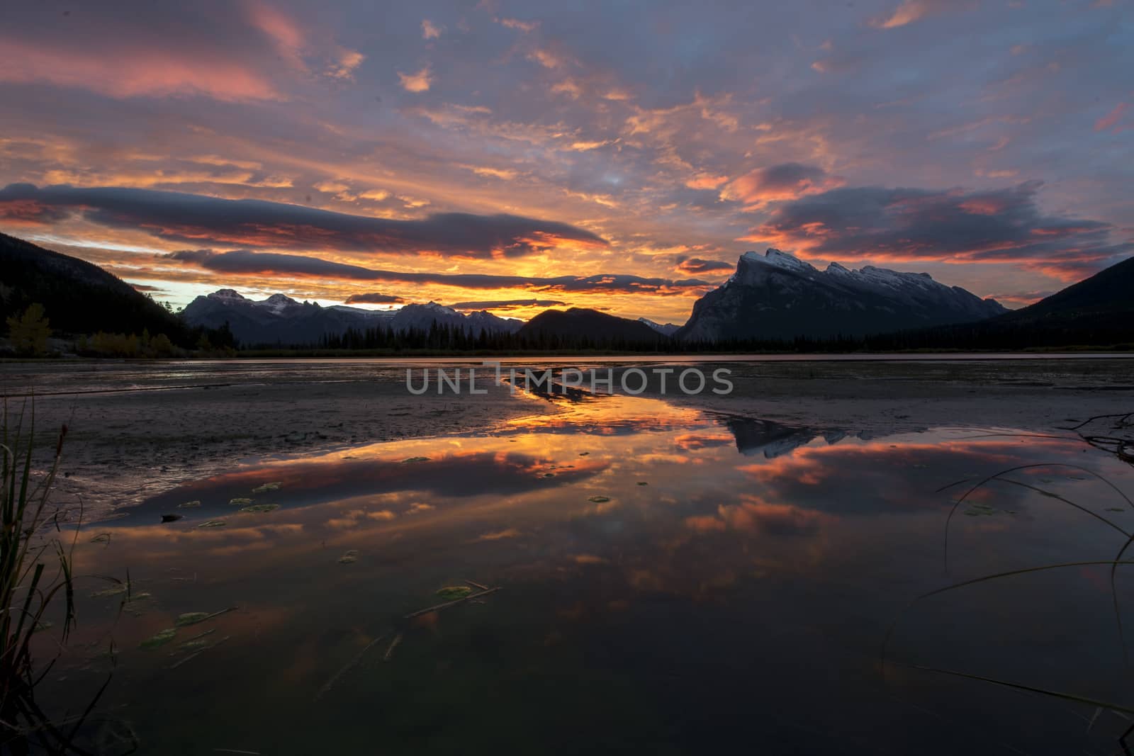 Beautiful sunrise over the rocky mountains at vermillion lake