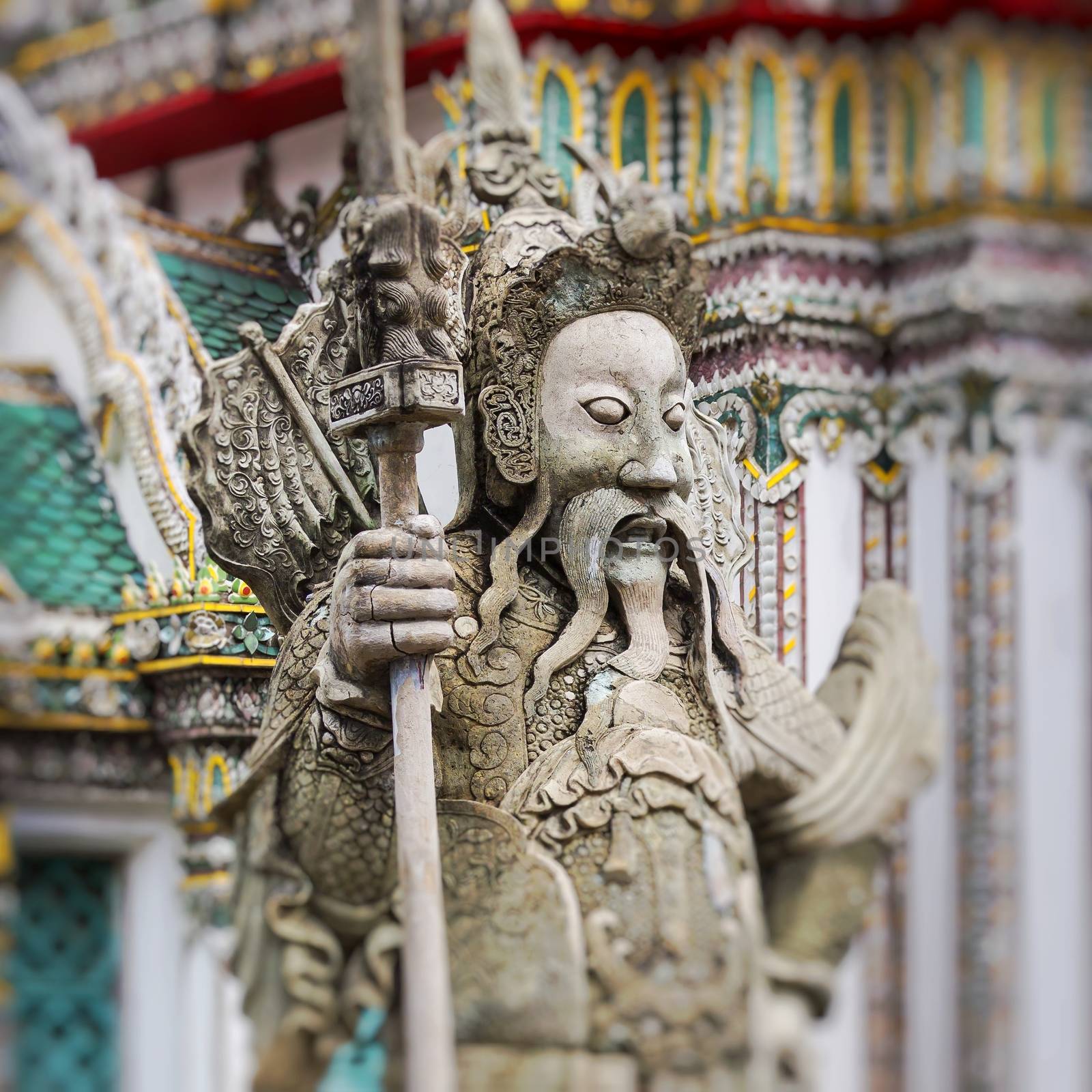 Statue of a Chinese warrior near an entrance of Wat Pho. Wat Pho by mariusz_prusaczyk