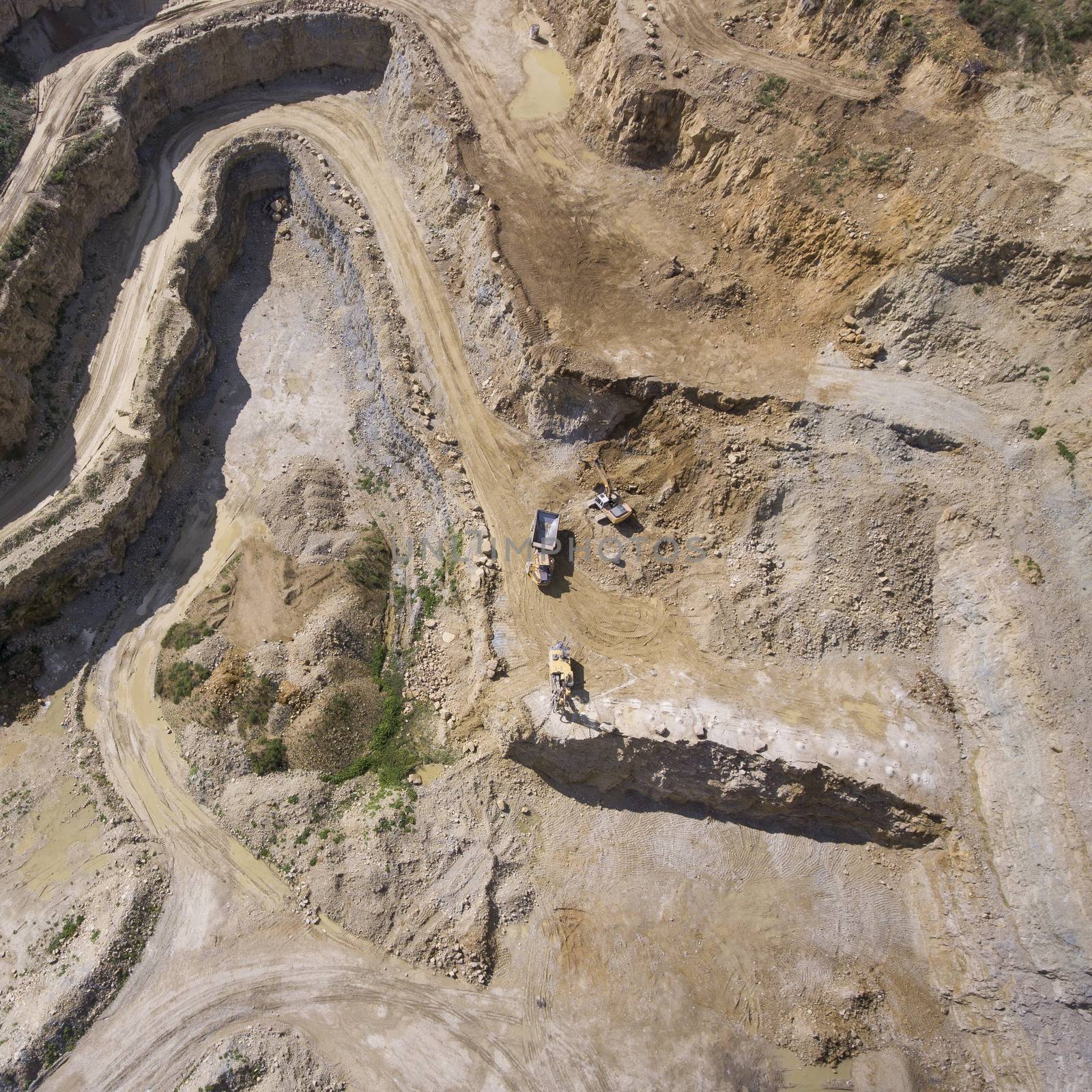 Mining quarry with special equipment, open pit excavation. Sand mine. View from above.