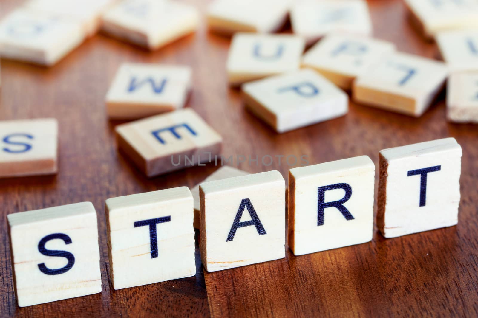 start business letters placed on a desk in precious wood by pixinoo