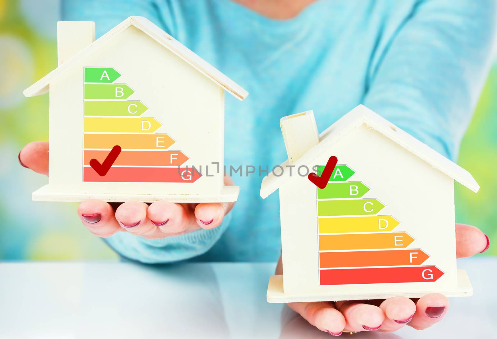 concept comparison between normal house and low consumption house with energy efficiency rating by pixinoo