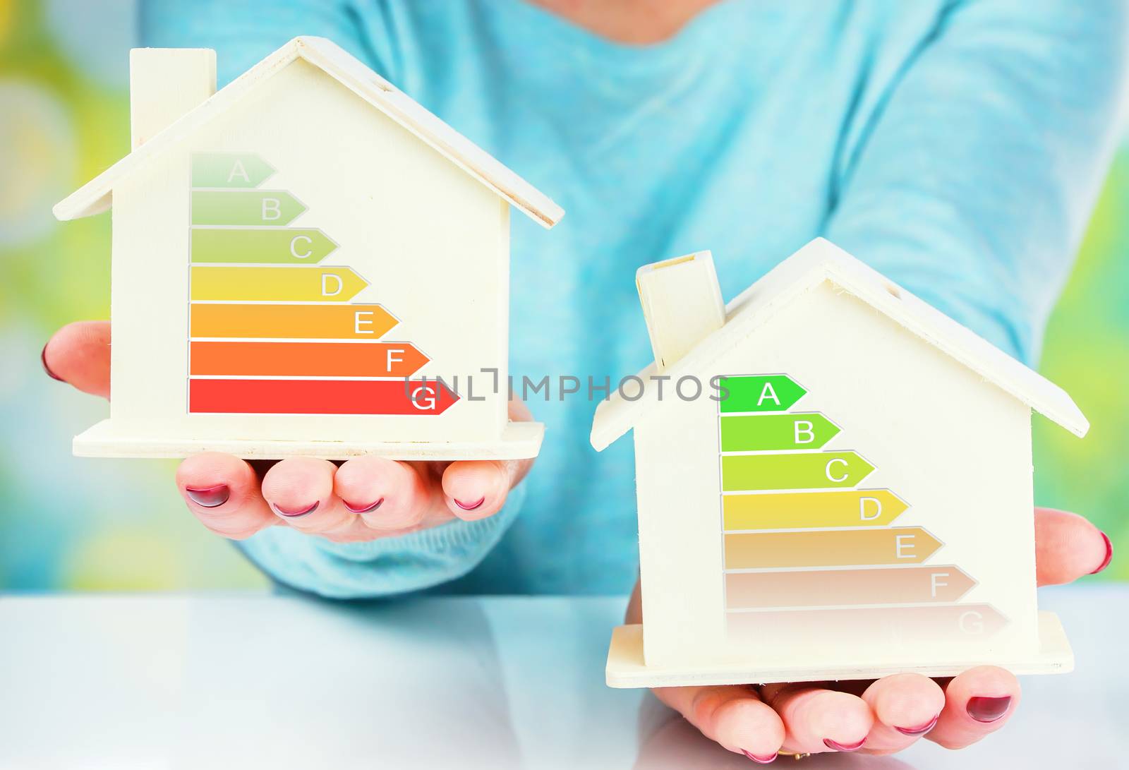 concept comparison between normal house and low consumption house with energy efficiency rating