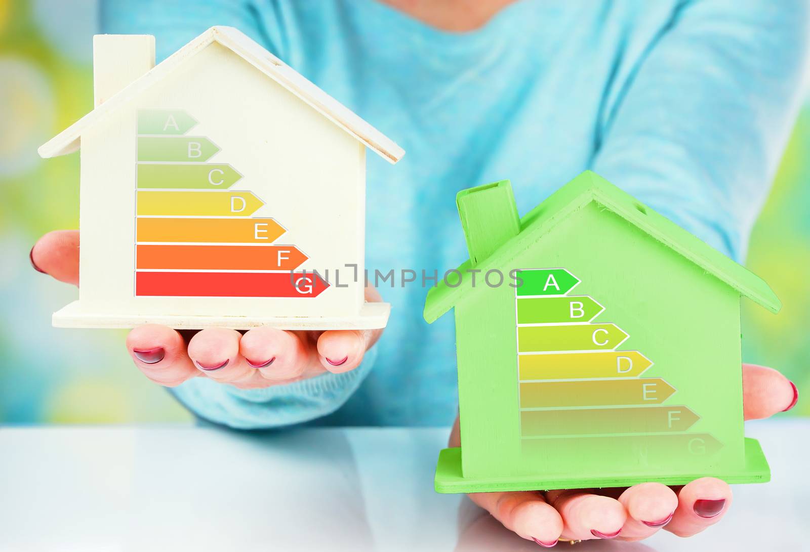 concept comparison between normal house and low consumption house with energy efficiency rating