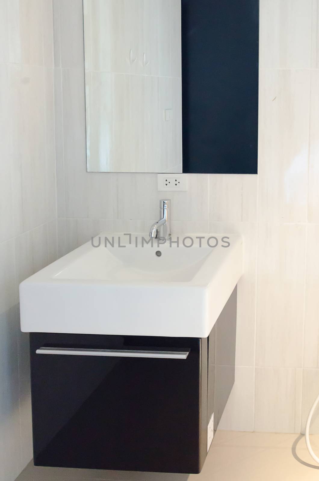 Luxury wash basin in a bathroom, an interior modern design.