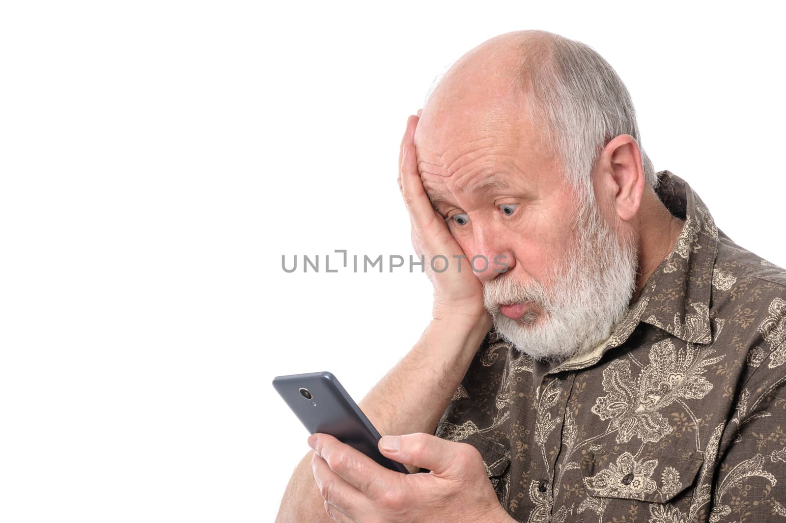 Portrait of senior man with mobile smartphone, isolated on white background